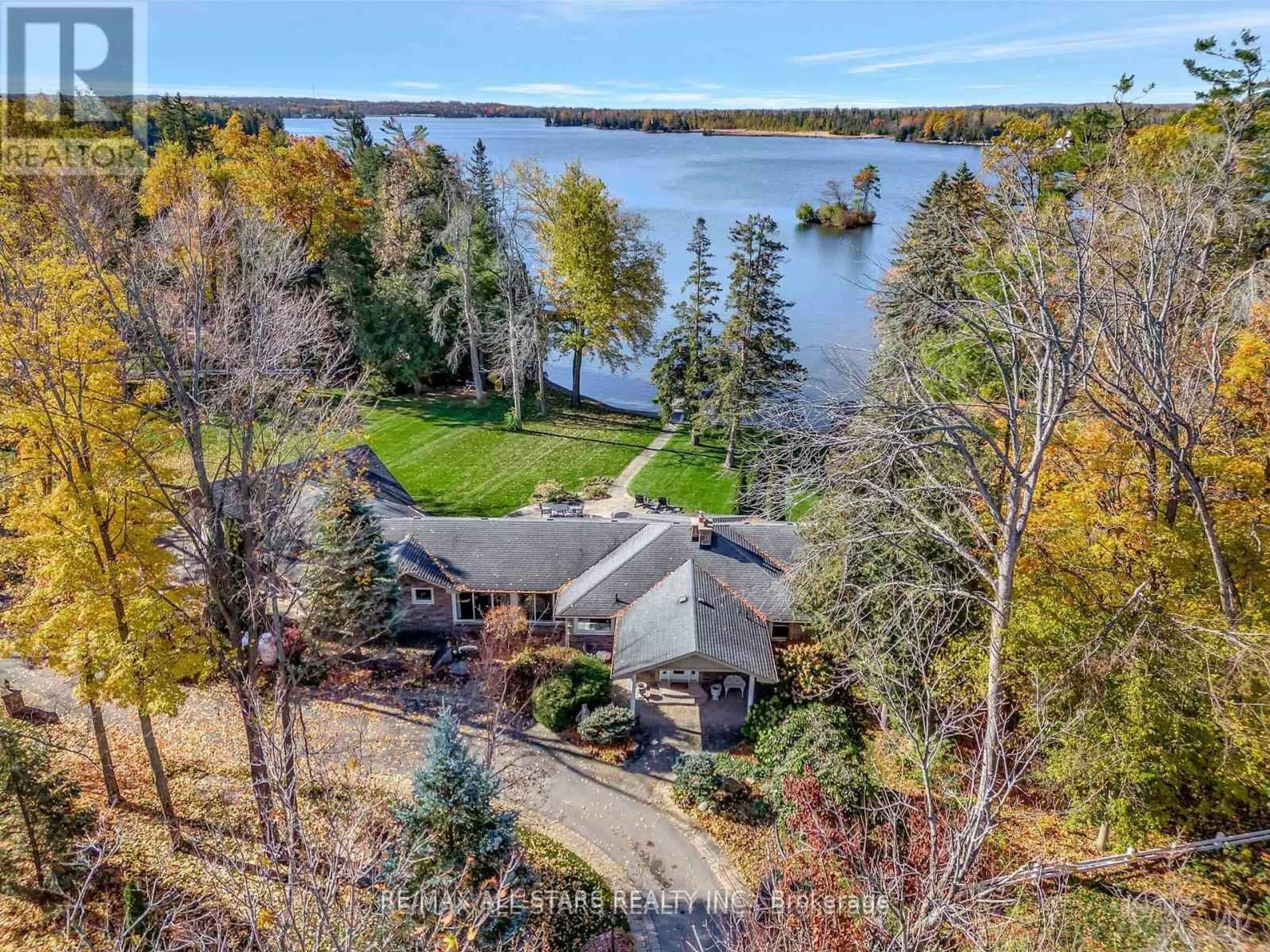 A pic from outside/outdoor area/front of a property/back of a property/a pic from drone, water/lake/river/ocean view for 8 Manor Rd, Kawartha Lakes Ontario K0M 1A0