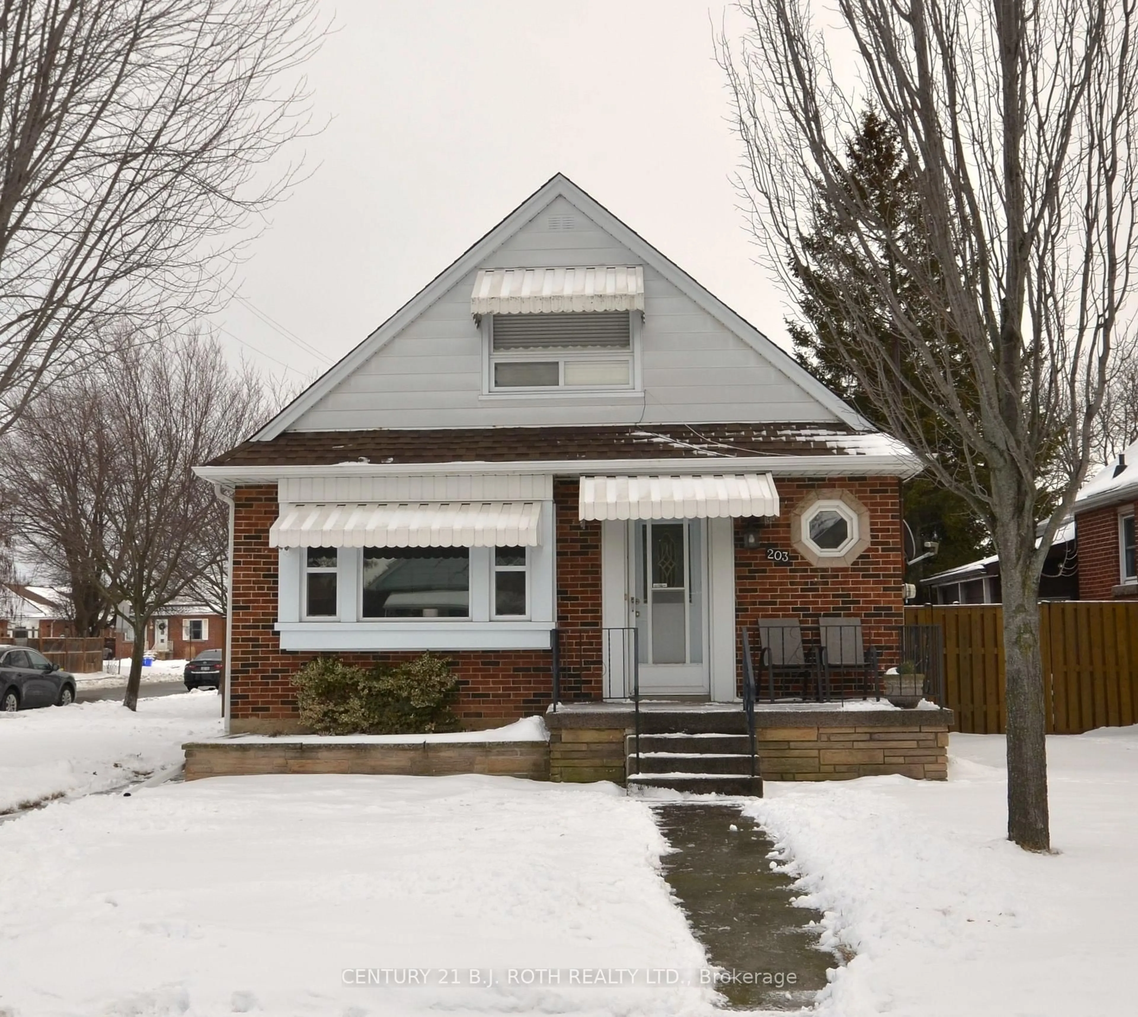 Home with brick exterior material, street for 203 Summerhill Ave, Hamilton Ontario L8K 3N6