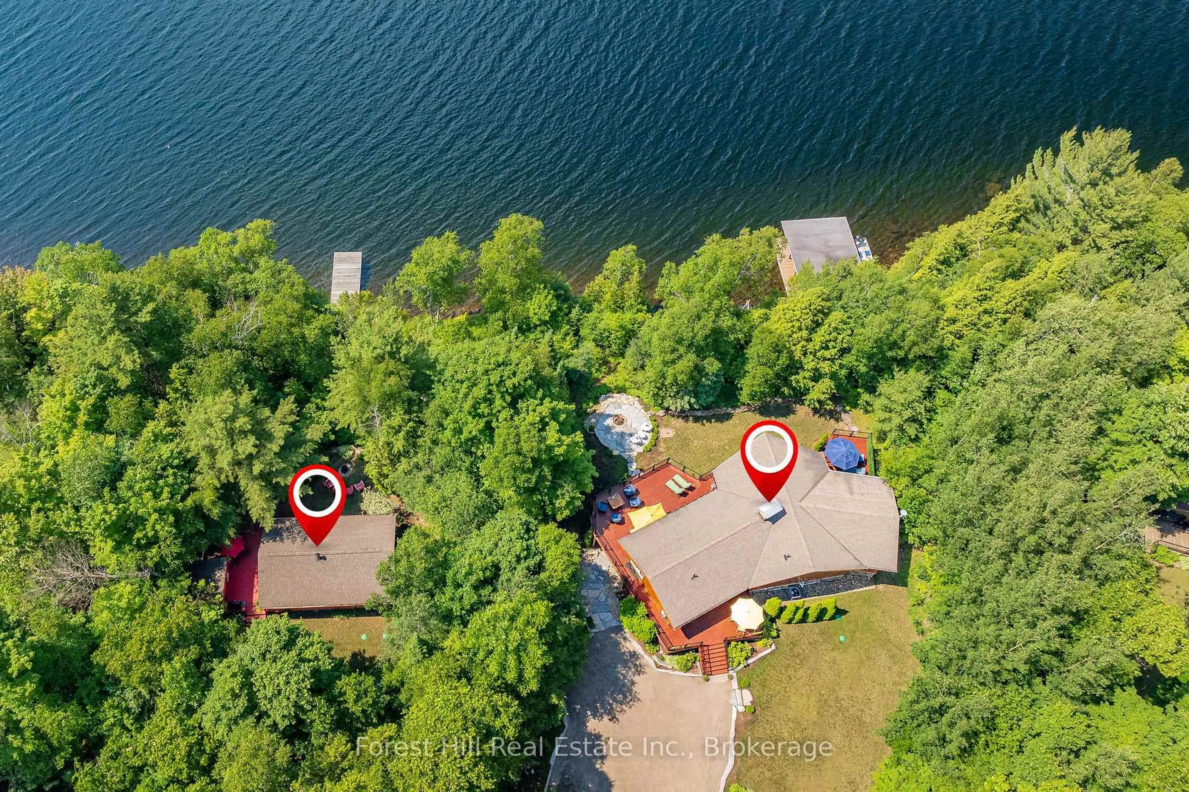 A pic from outside/outdoor area/front of a property/back of a property/a pic from drone, water/lake/river/ocean view for 4475 Kawagama Lake Rd, Algonquin Highlands Ontario P0A 1E0
