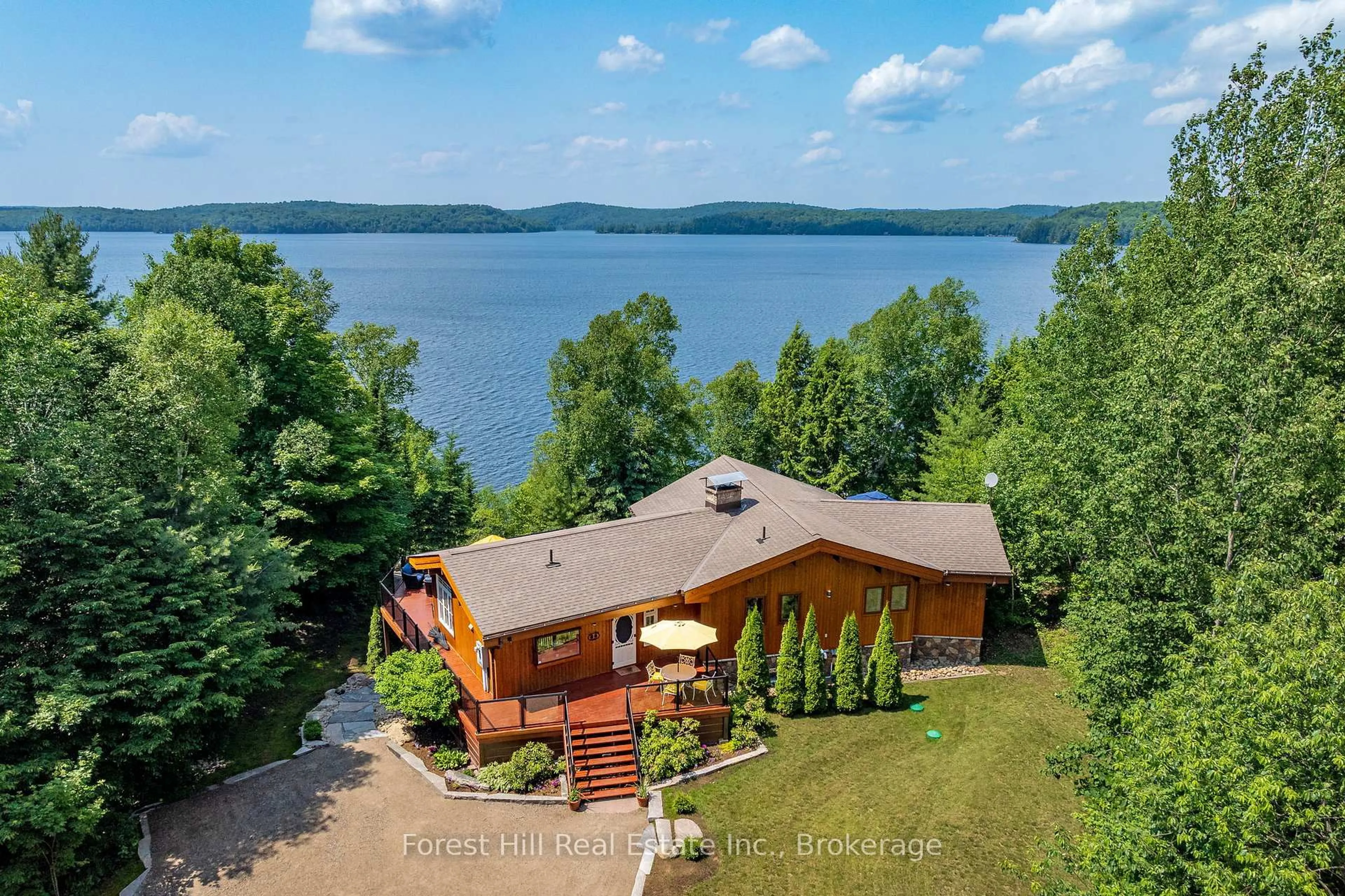 A pic from outside/outdoor area/front of a property/back of a property/a pic from drone, water/lake/river/ocean view for 4475 Kawagama Lake Rd, Algonquin Highlands Ontario P0A 1E0
