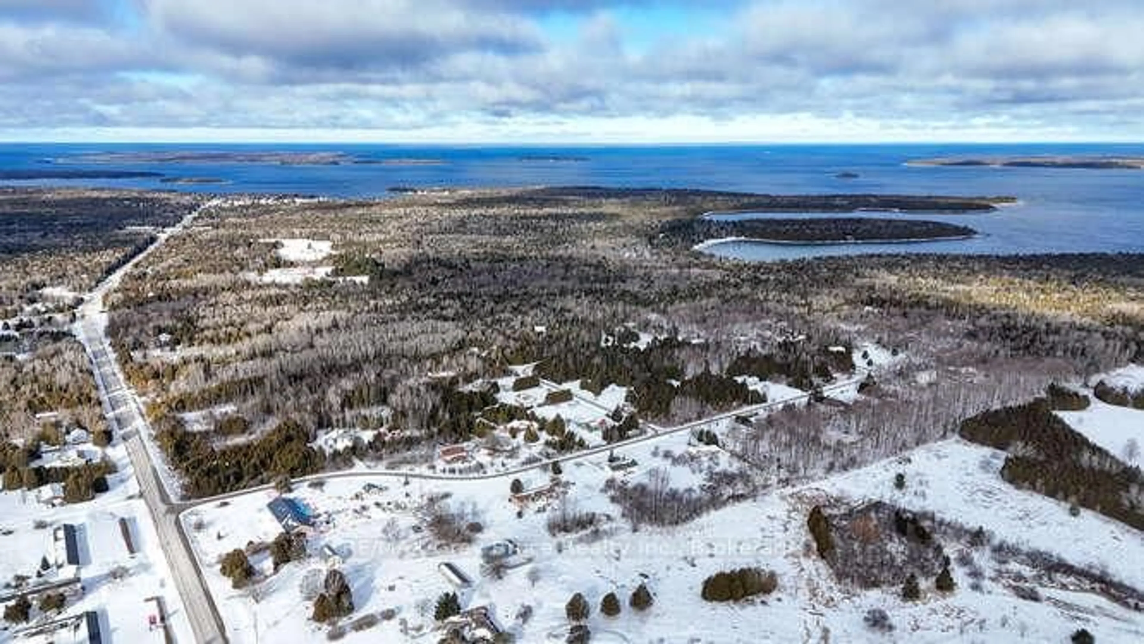 A pic from outside/outdoor area/front of a property/back of a property/a pic from drone, water/lake/river/ocean view for 26 Maple Golf Cres, Northern Bruce Peninsula Ontario N0H 2R0