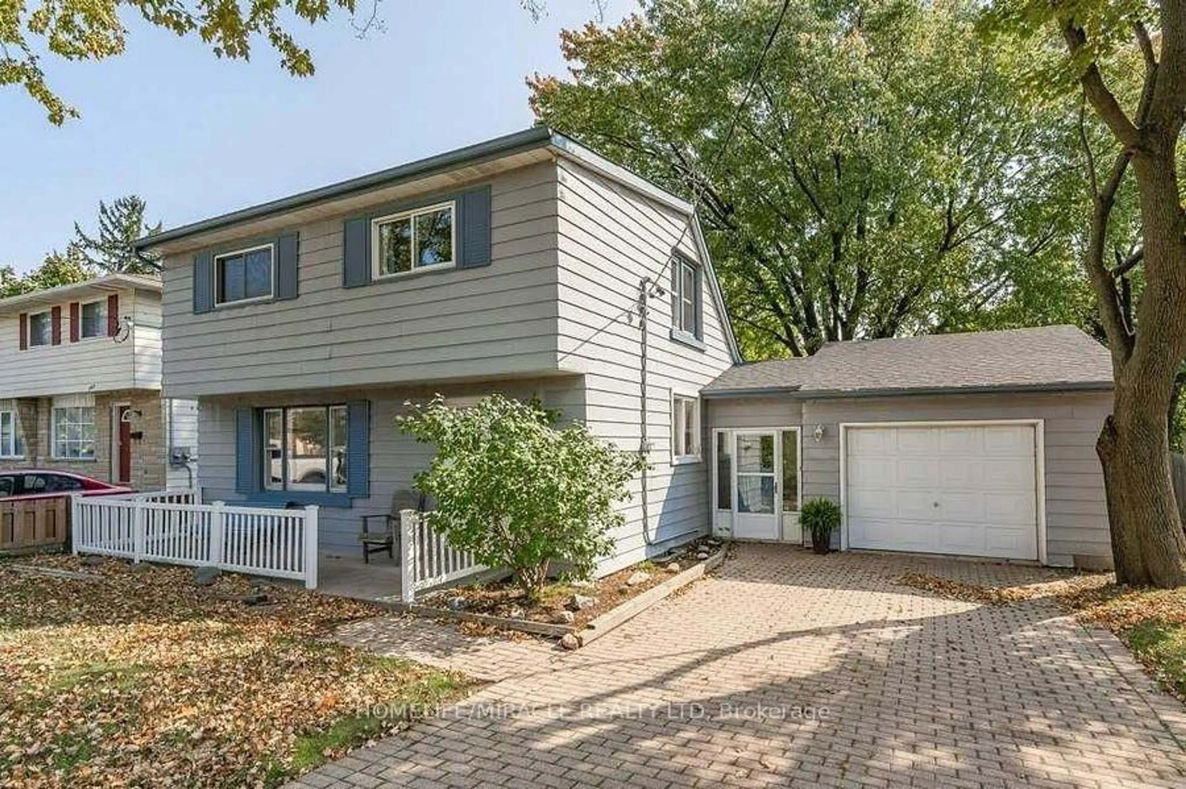 Home with vinyl exterior material, street for 1257 Ottawa St, Kitchener Ontario N2E 1L9