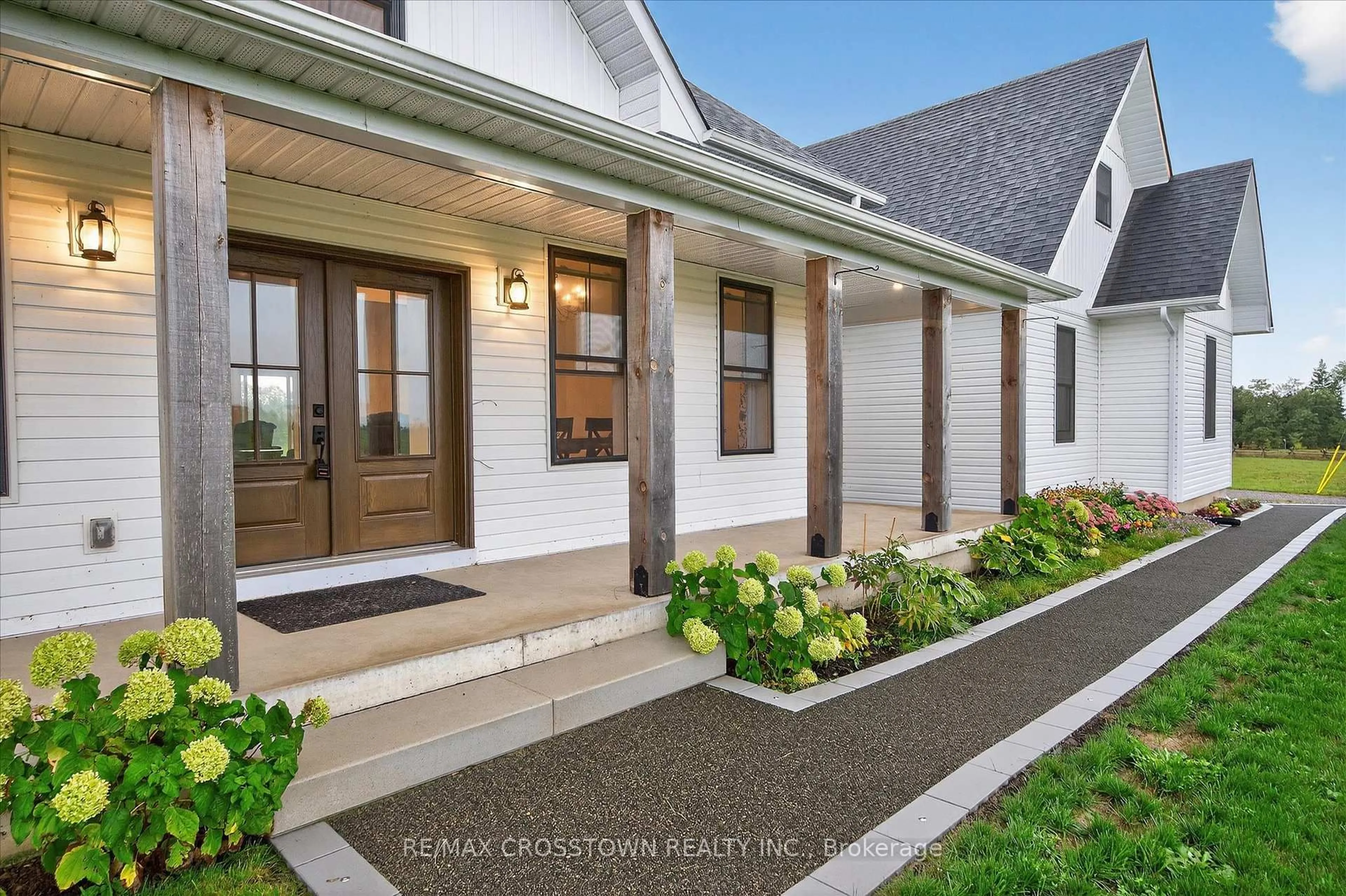 Home with vinyl exterior material, street for 613 County Rd 8 Rd, Douro-Dummer Ontario K0L 2B0