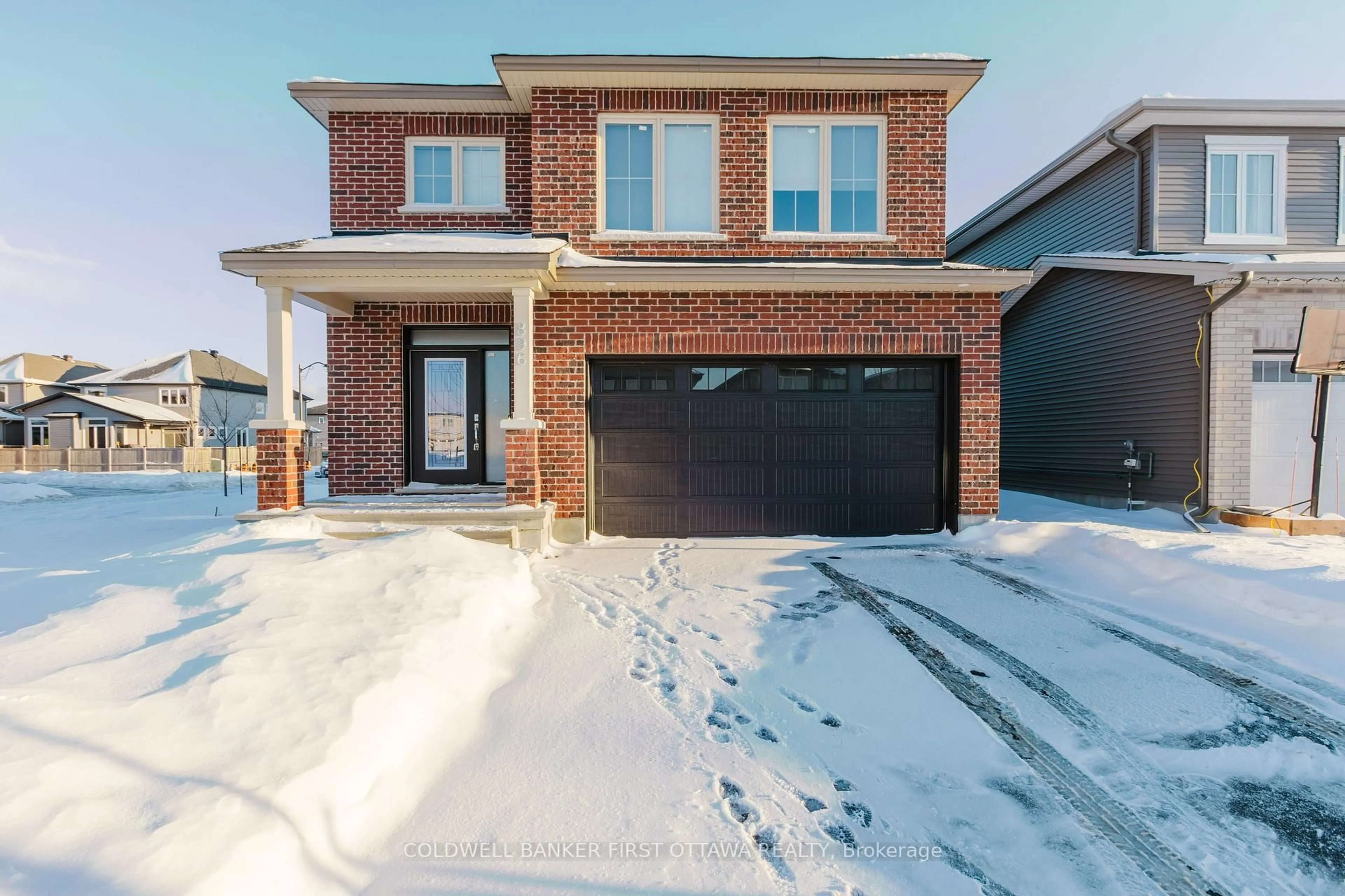 Home with brick exterior material, street for 896 Sendero Way, Stittsville Ontario K2S 2W8