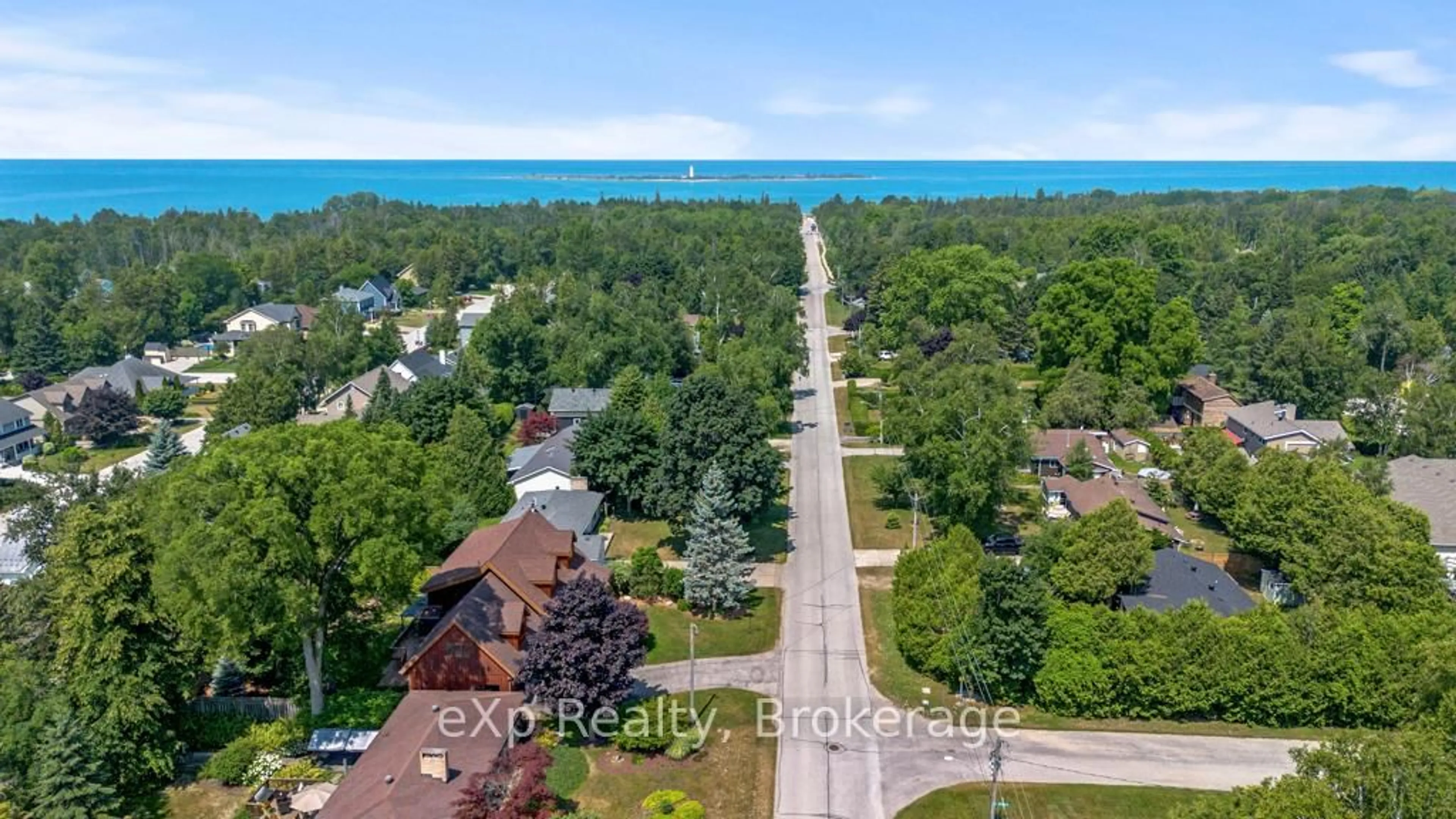 A pic from outside/outdoor area/front of a property/back of a property/a pic from drone, water/lake/river/ocean view for 271 Bay St, Saugeen Shores Ontario N0H 2L0
