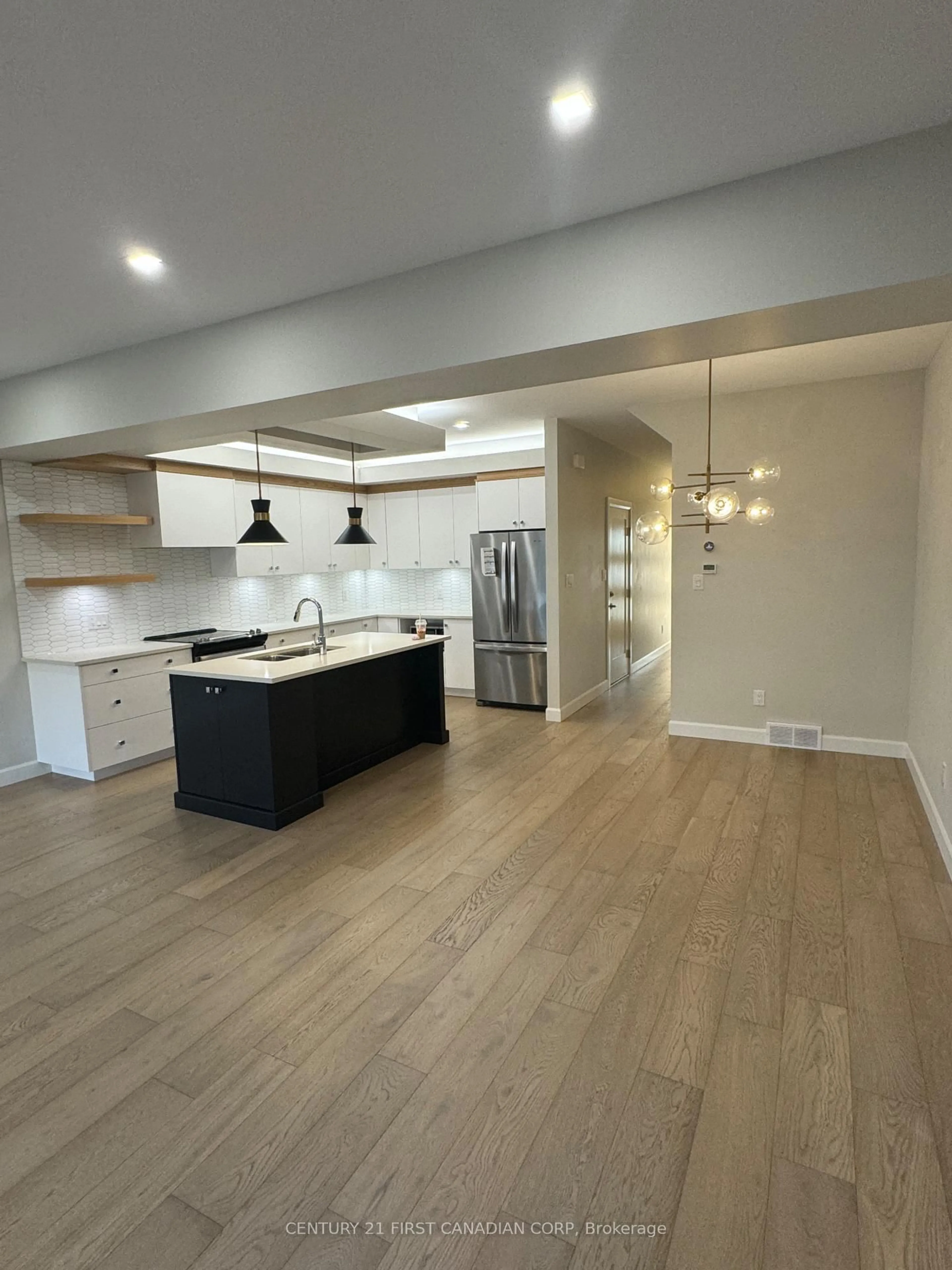 Open concept kitchen, wood/laminate floor for 2358 Fair Oaks Blvd, London North Ontario N6G 0X4