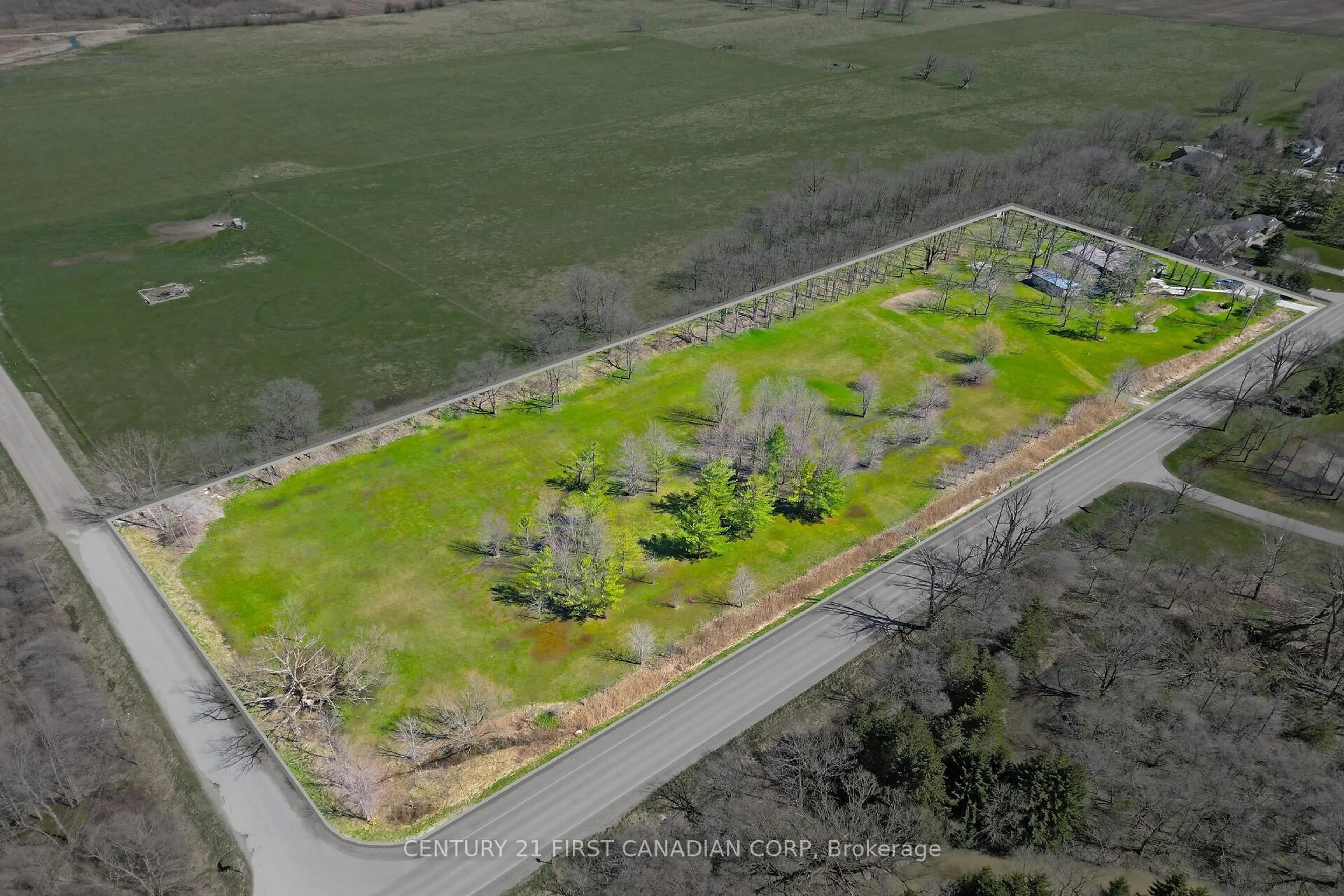 A pic from outside/outdoor area/front of a property/back of a property/a pic from drone, unknown for 23992 Denfield Rd, Middlesex Centre Ontario N0M 1P0