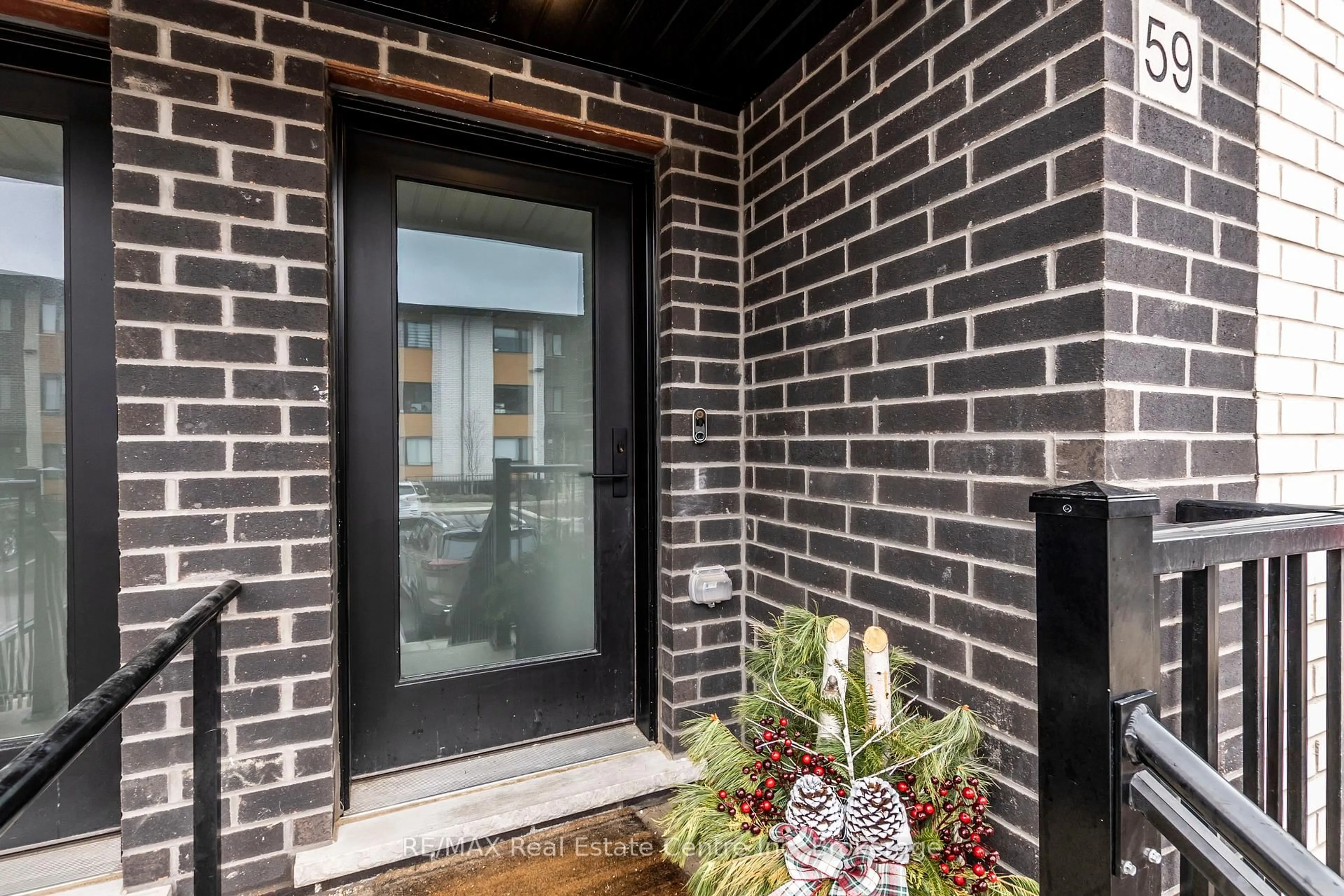 Home with brick exterior material, street for 59 Lily Lane, Guelph Ontario N1L 0R2