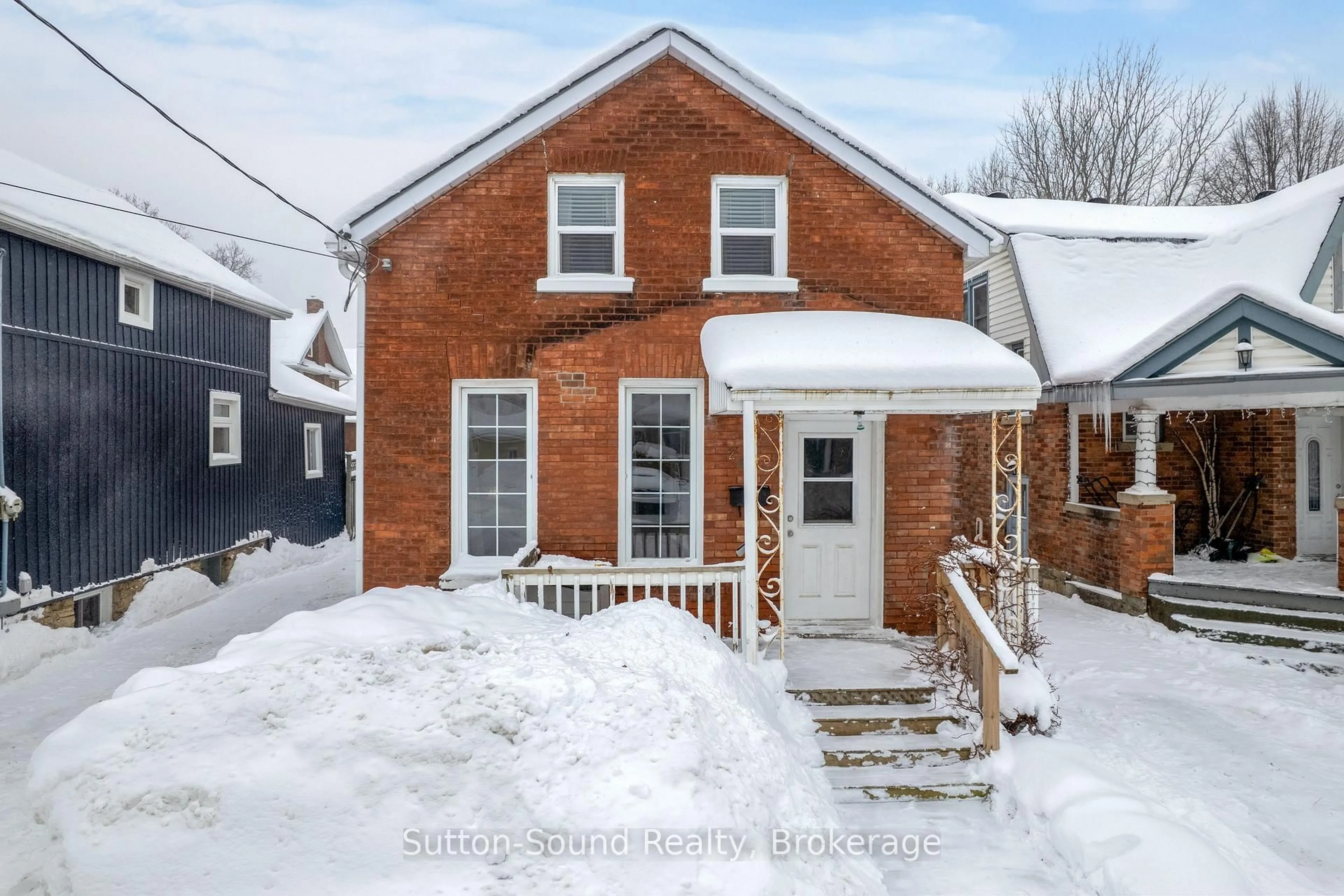 Home with brick exterior material, street for 269 6th St, Owen Sound Ontario N4K 1E8