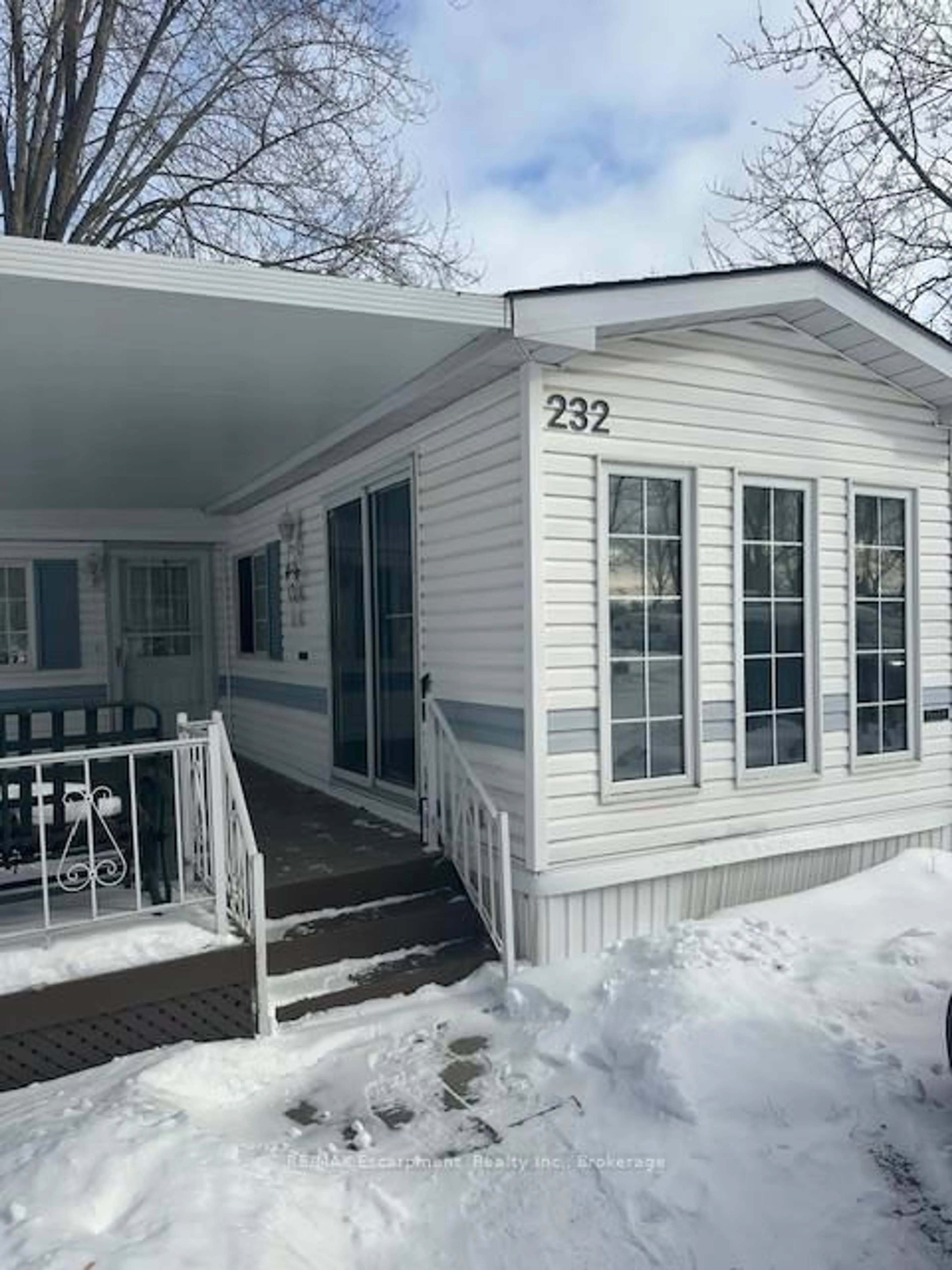 Home with vinyl exterior material, street for 8845 Lundy's Lane #232, Niagara Falls Ontario L2H 1H5