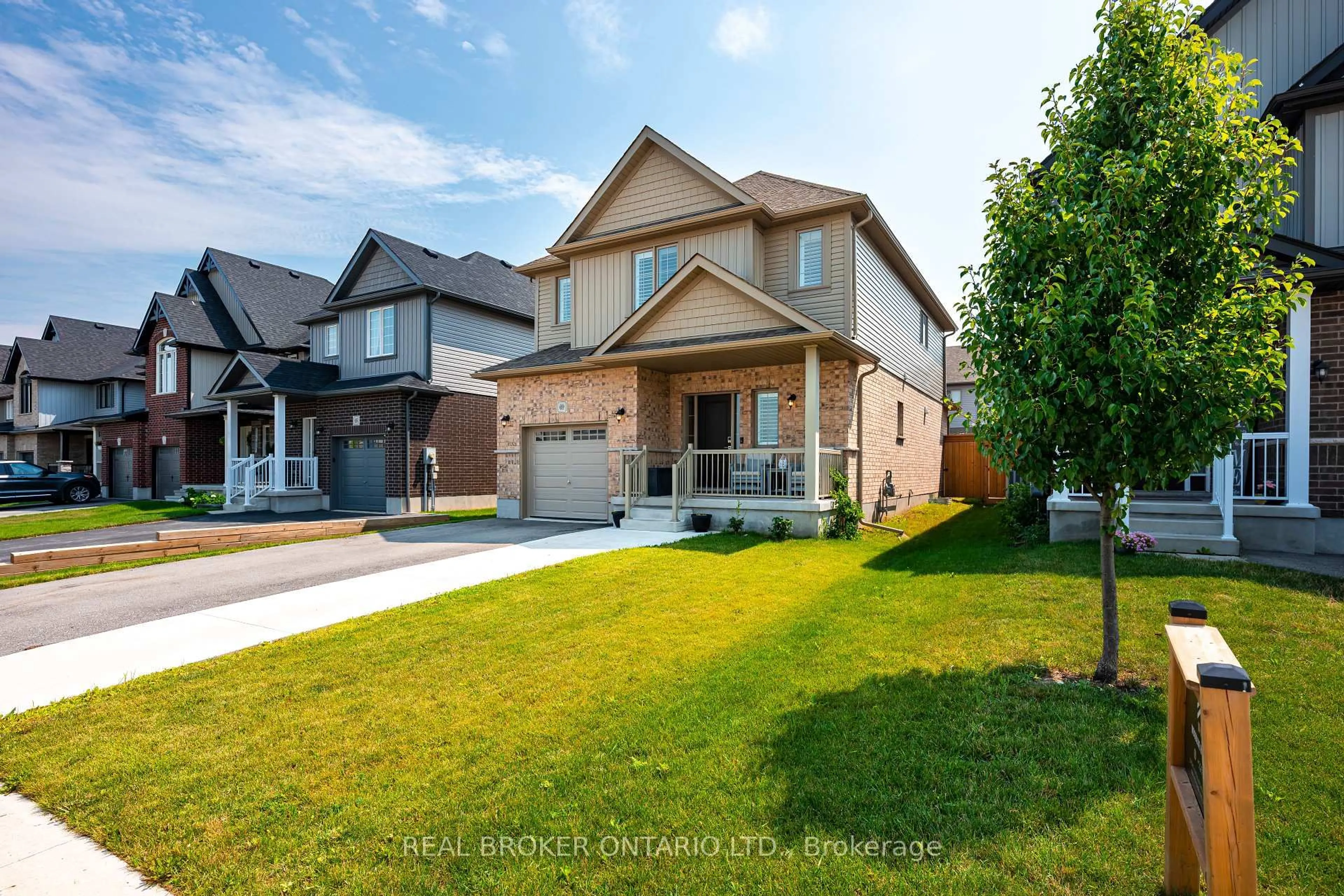 Home with brick exterior material, street for 69 Miranda Path, Woolwich Ontario N3B 2C6