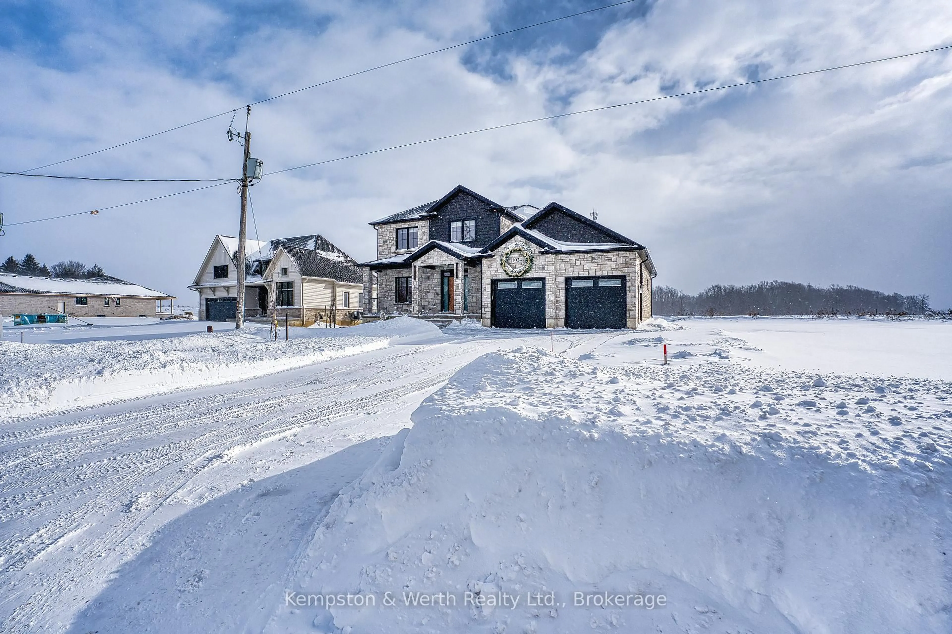 A pic from outside/outdoor area/front of a property/back of a property/a pic from drone, street for 1034 Walton Ave, North Perth Ontario N4W 3S2