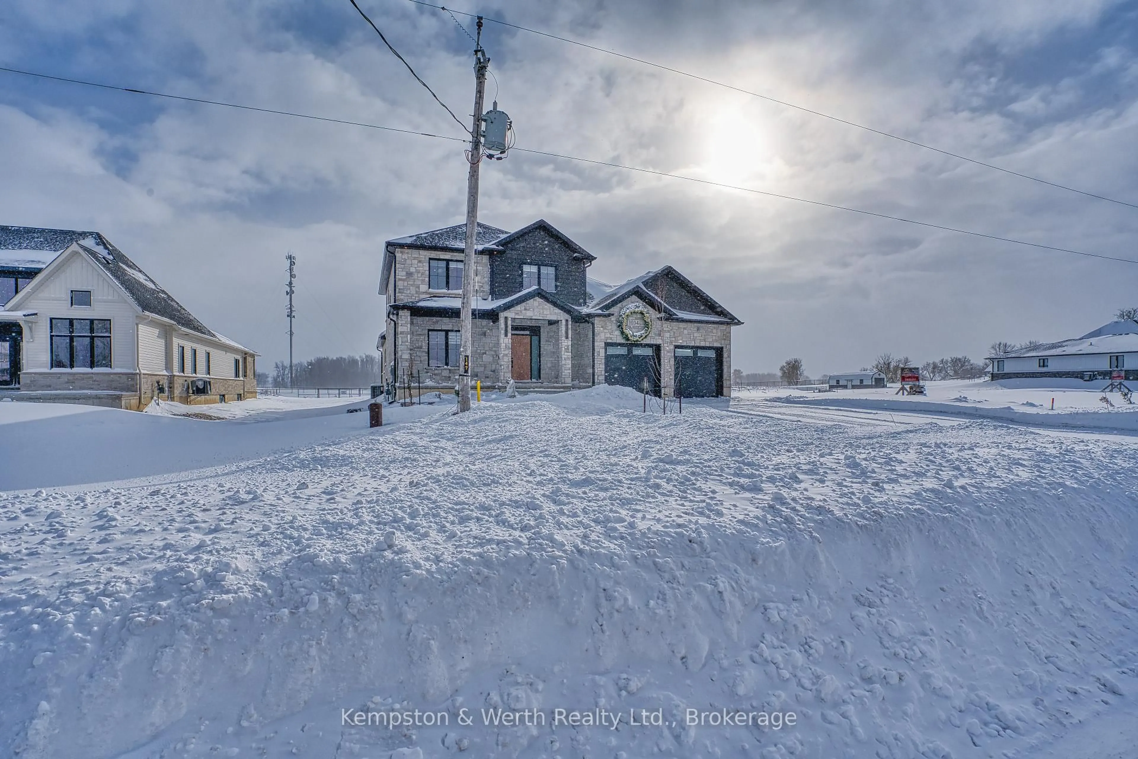A pic from outside/outdoor area/front of a property/back of a property/a pic from drone, street for 1034 Walton Ave, North Perth Ontario N4W 3S2
