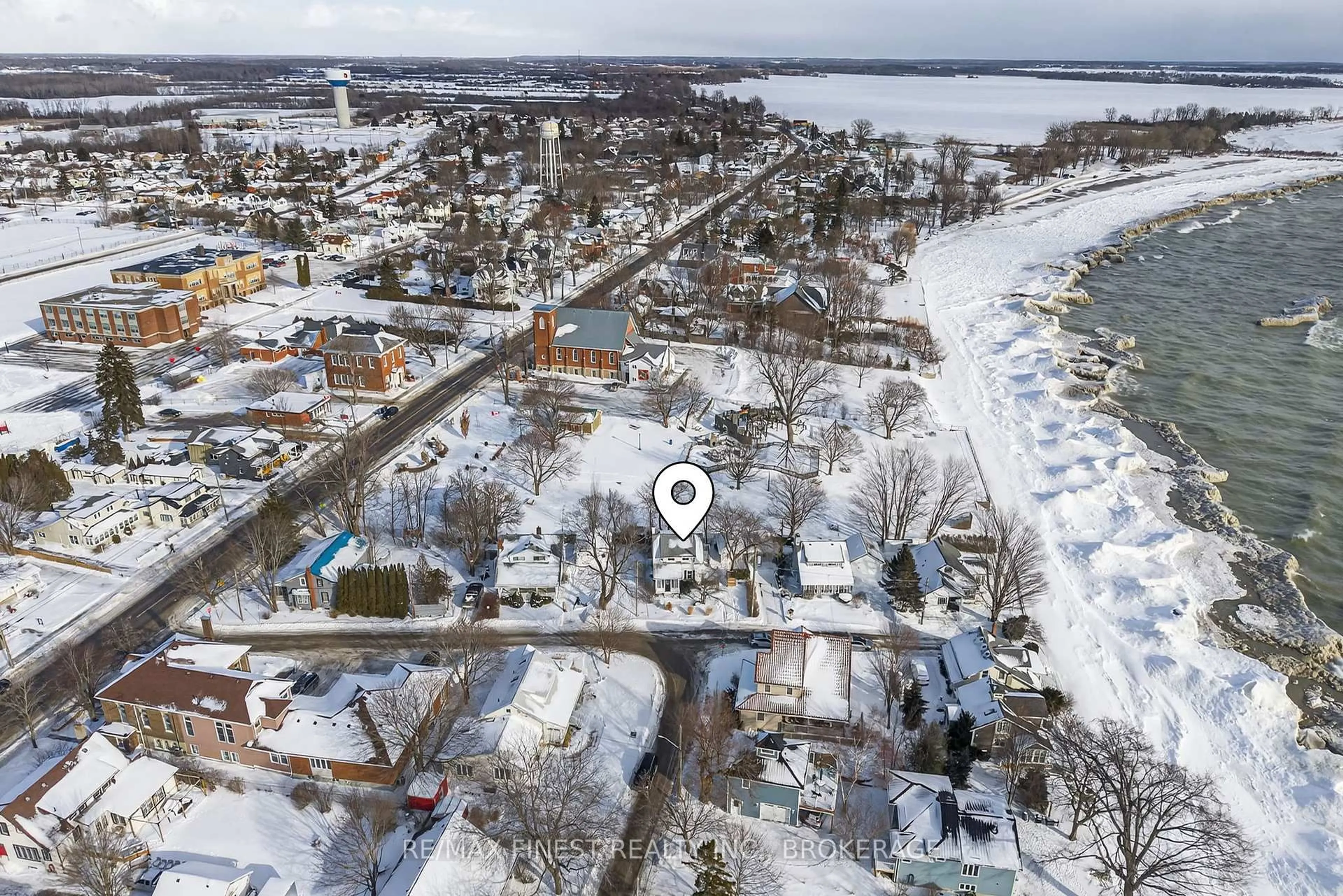 A pic from outside/outdoor area/front of a property/back of a property/a pic from drone, water/lake/river/ocean view for 23 East St, Prince Edward County Ontario K0K 1L0