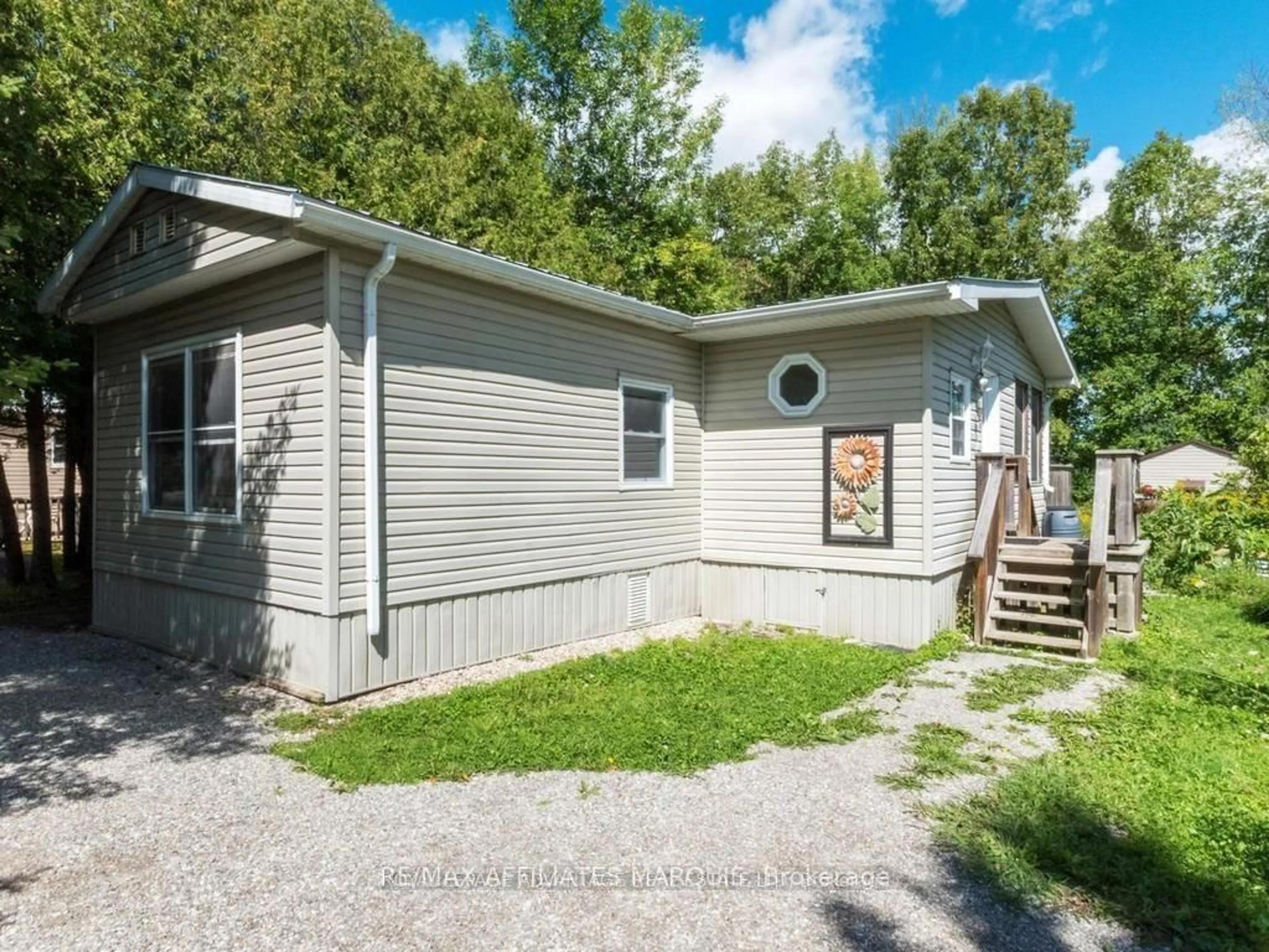 Home with vinyl exterior material, street for 26 Salmon Side Rd #213, Rideau Lakes Ontario K7A 4S5