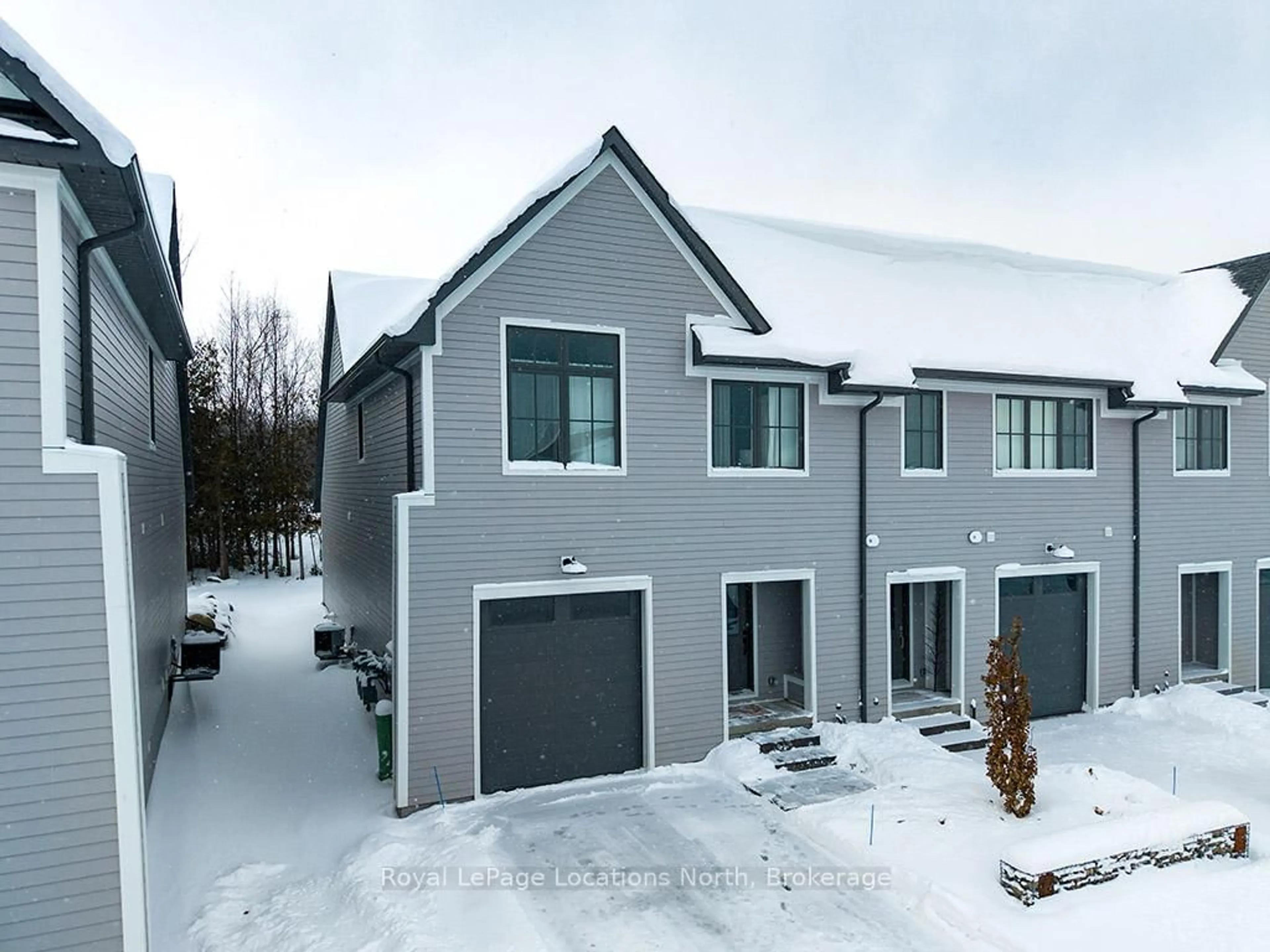 A pic from outside/outdoor area/front of a property/back of a property/a pic from drone, street for 134 Landry Lane #14, Blue Mountains Ontario N0H 2P0