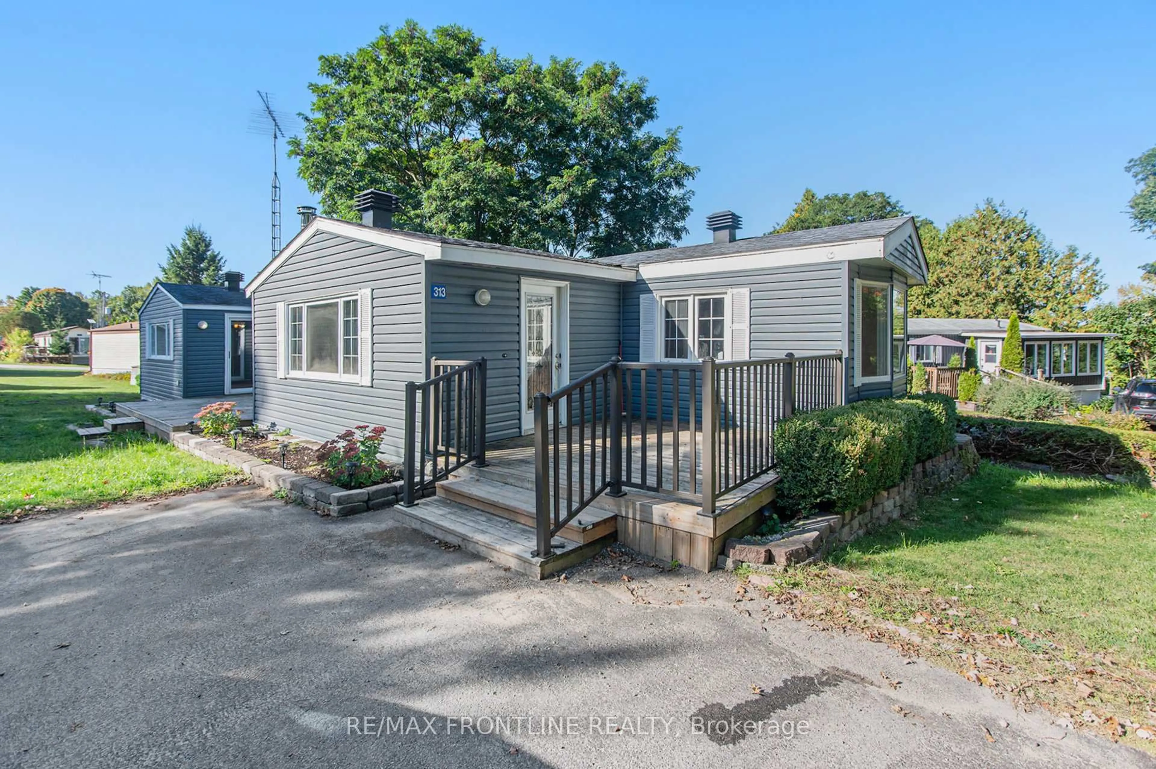 A pic from outside/outdoor area/front of a property/back of a property/a pic from drone, street for 313 Acacia Rd, Perth Ontario K7H 3C8