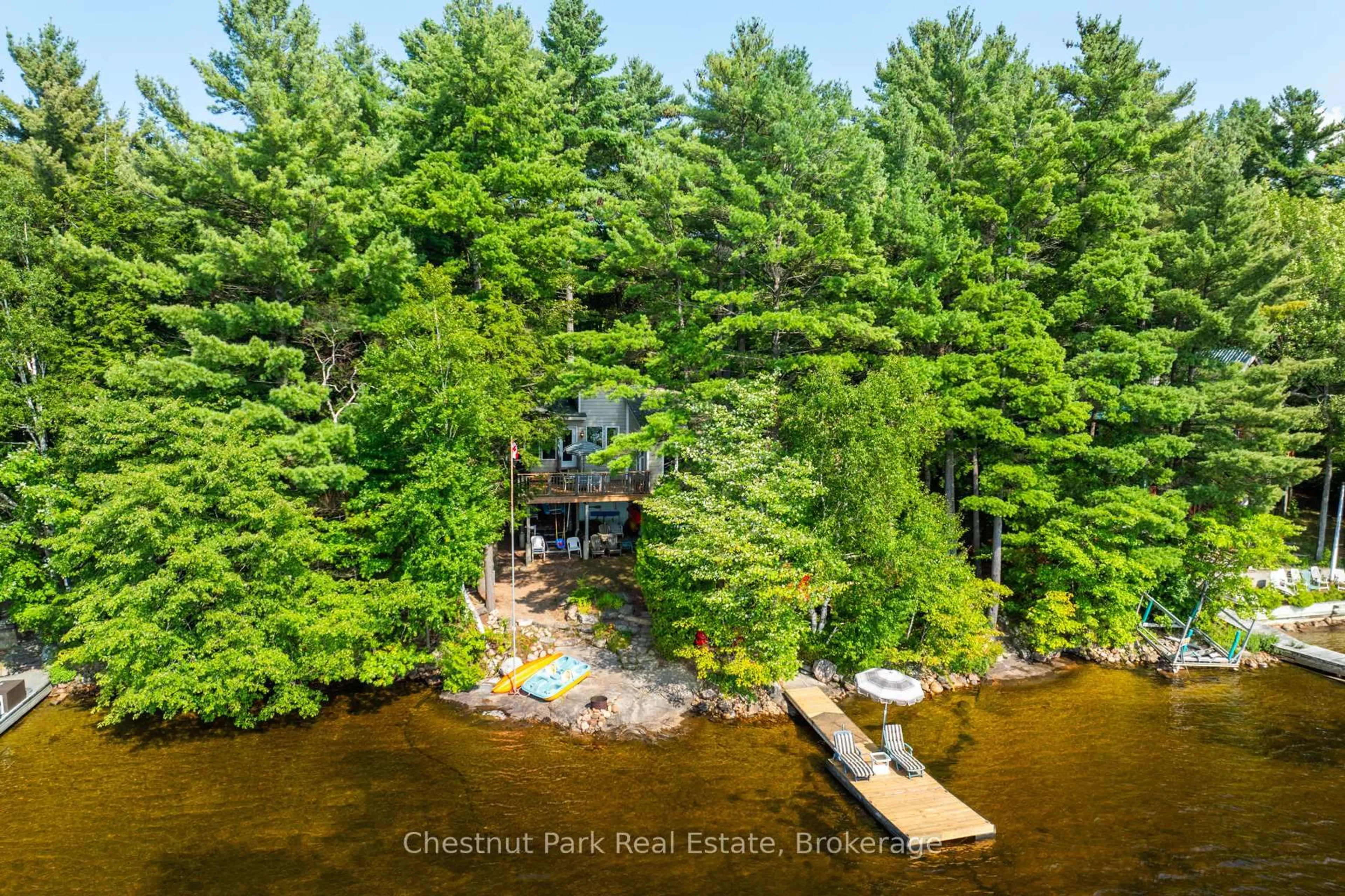 A pic from outside/outdoor area/front of a property/back of a property/a pic from drone, water/lake/river/ocean view for 1111 Buckeye Rd #Unit #8, Muskoka Lakes Ontario P0C 1H0