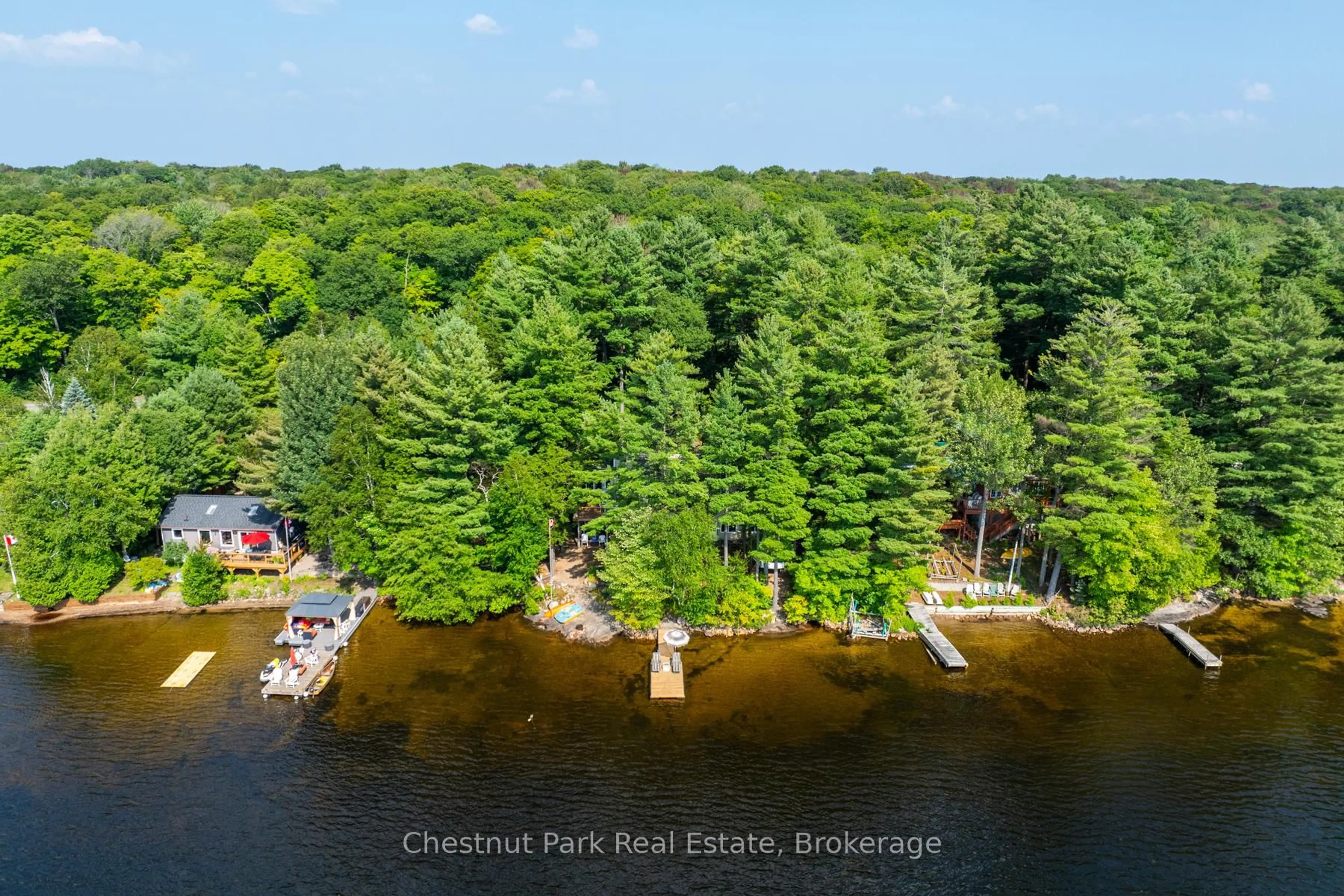 A pic from outside/outdoor area/front of a property/back of a property/a pic from drone, water/lake/river/ocean view for 1111 Buckeye Rd #Unit #8, Muskoka Lakes Ontario P0C 1H0