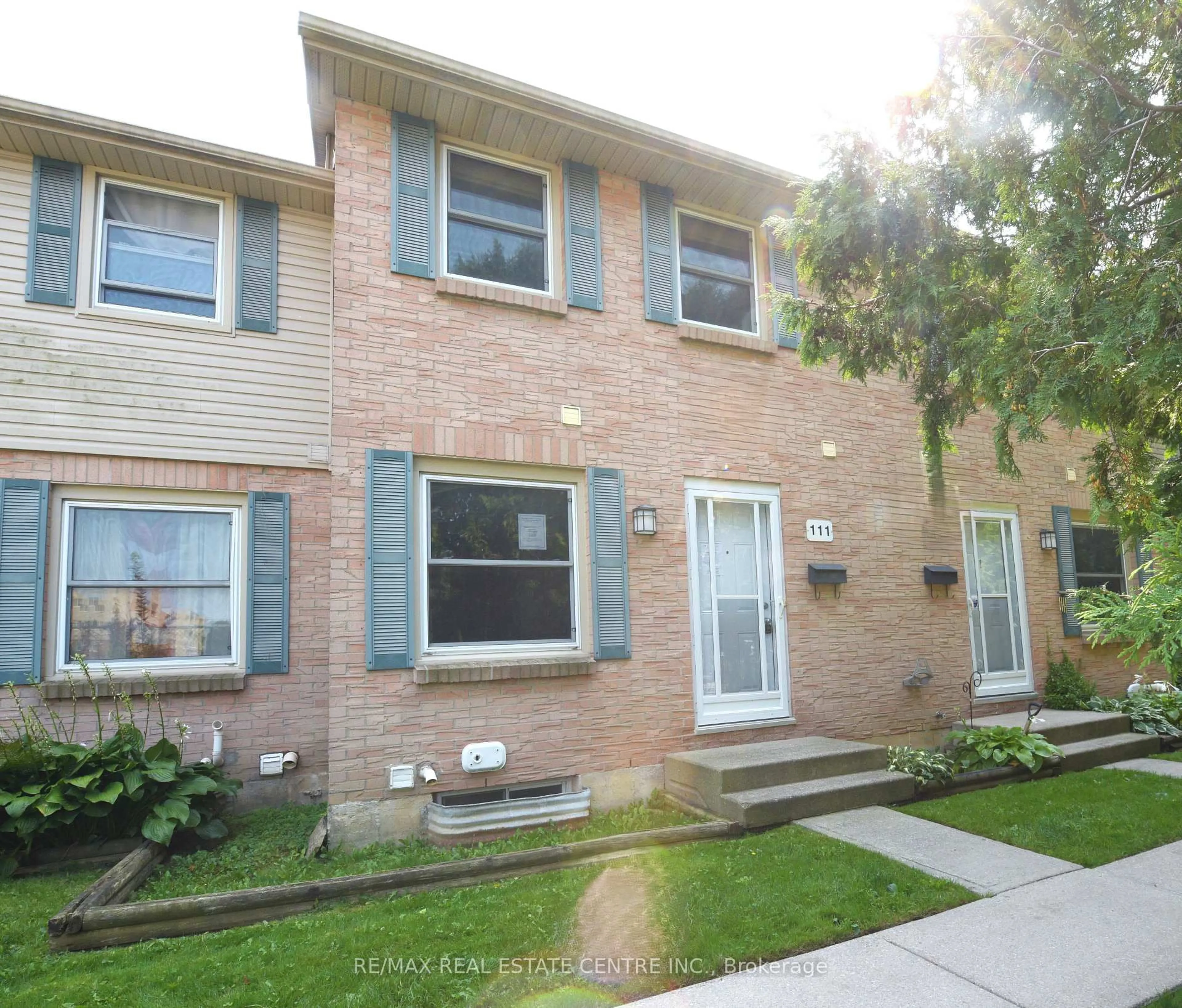 Home with brick exterior material, street for 1247 Huron St #111, London East Ontario N5Y 4X7