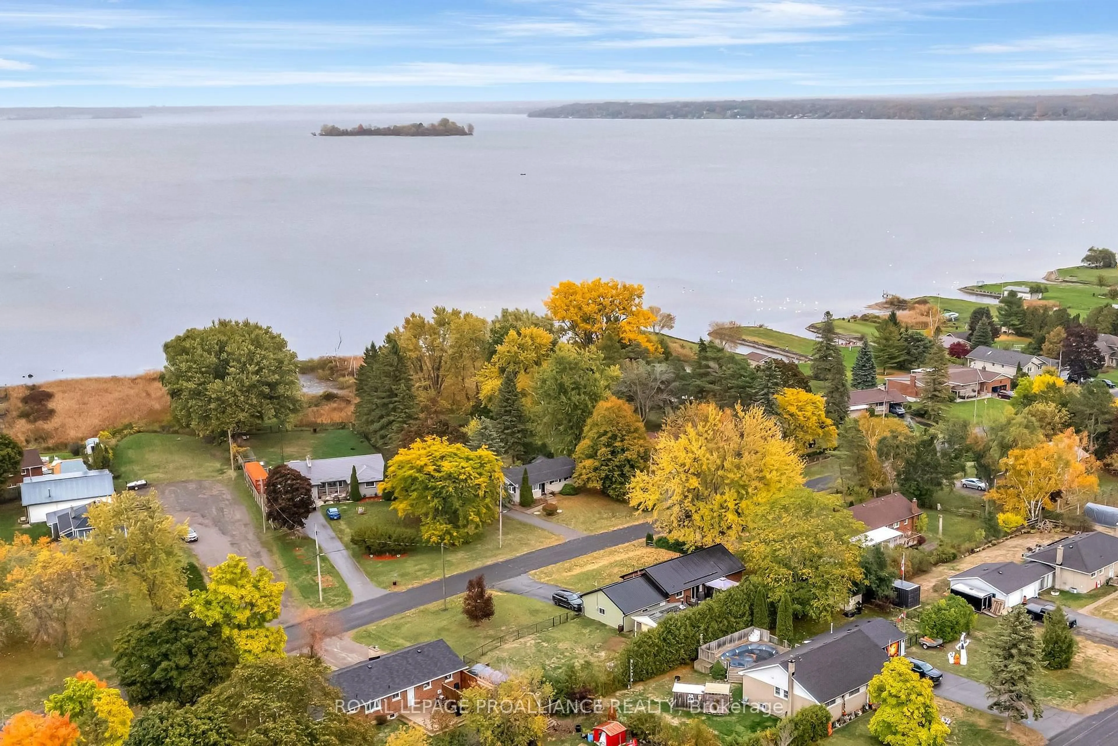 A pic from outside/outdoor area/front of a property/back of a property/a pic from drone, water/lake/river/ocean view for 97 Roseland Dr, Quinte West Ontario K0K 1L0
