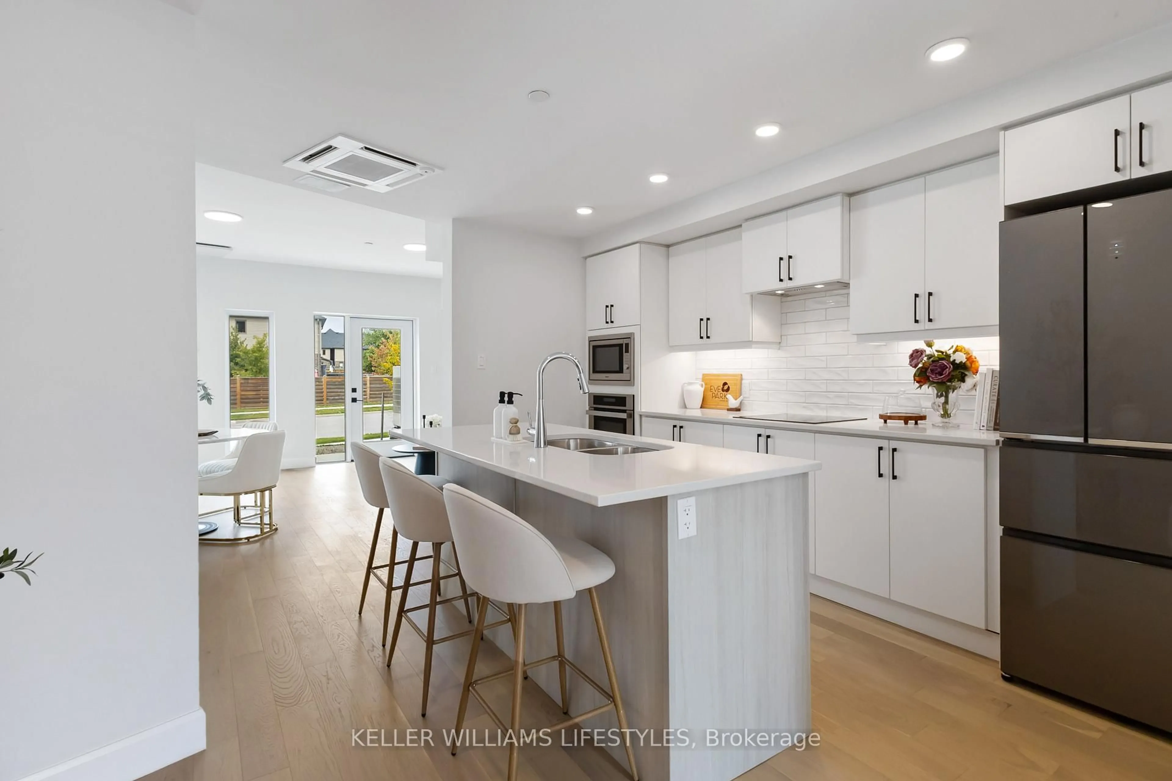 Open concept kitchen, ceramic/tile floor for 2082 Lumen Dr #B117, London South Ontario N6K 0L3