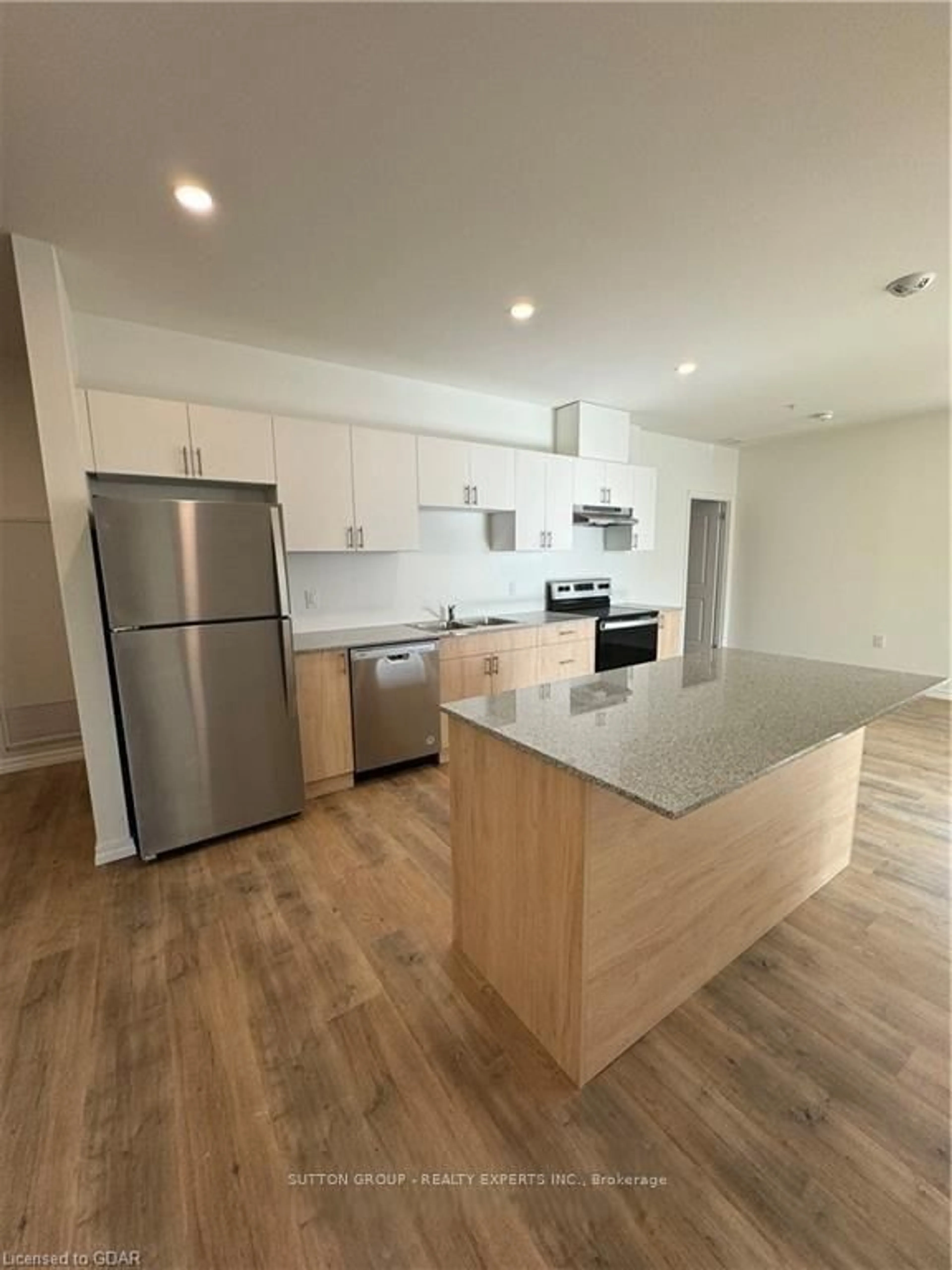 Open concept kitchen, wood/laminate floor for 1098 PAISLEY Rd #105 A, Guelph Ontario N1K 0C6