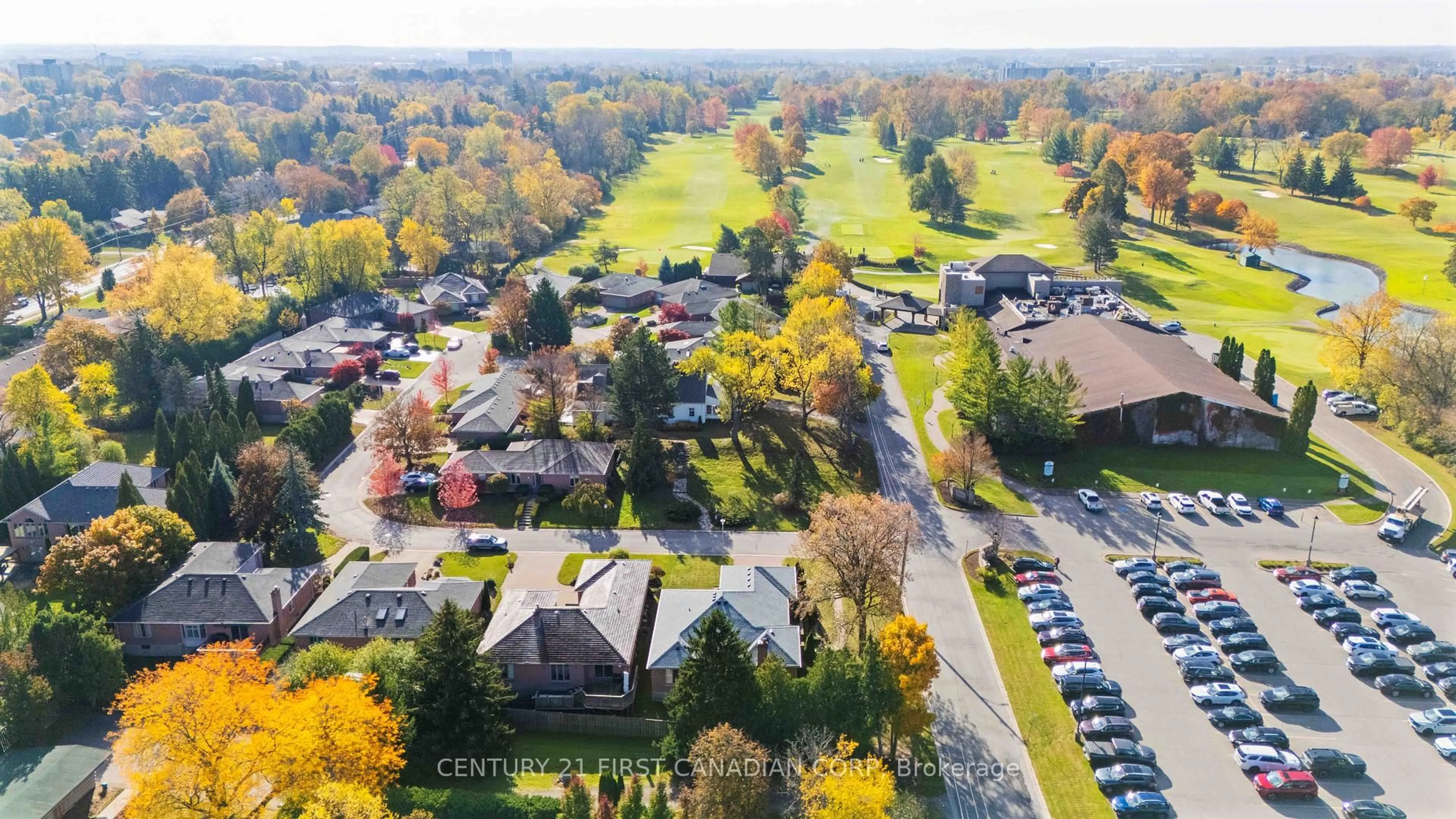 A pic from outside/outdoor area/front of a property/back of a property/a pic from drone, mountain view for 4 Barons Crt, London South Ontario N6C 5J3
