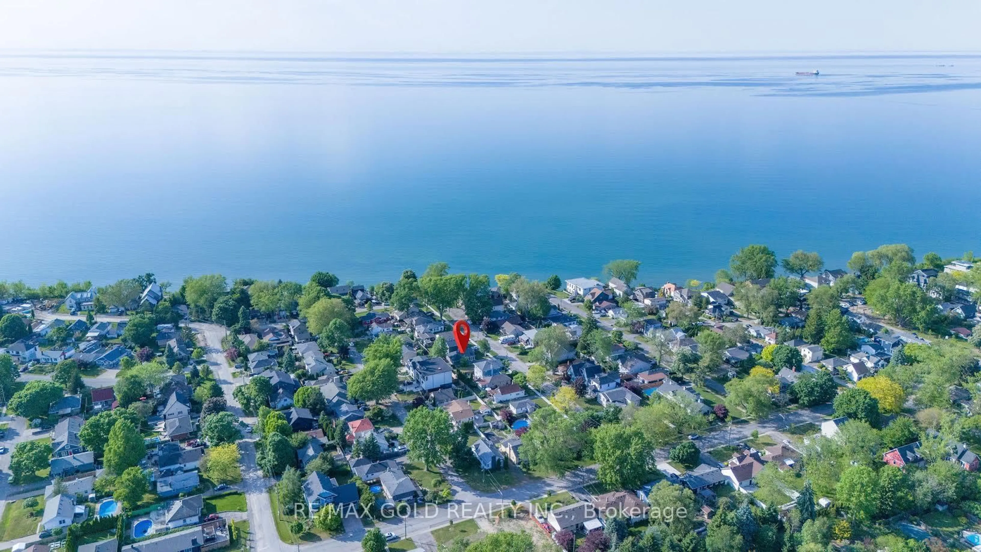 A pic from outside/outdoor area/front of a property/back of a property/a pic from drone, water/lake/river/ocean view for 15 Shelley Ave, St. Catharines Ontario L2N 5L4