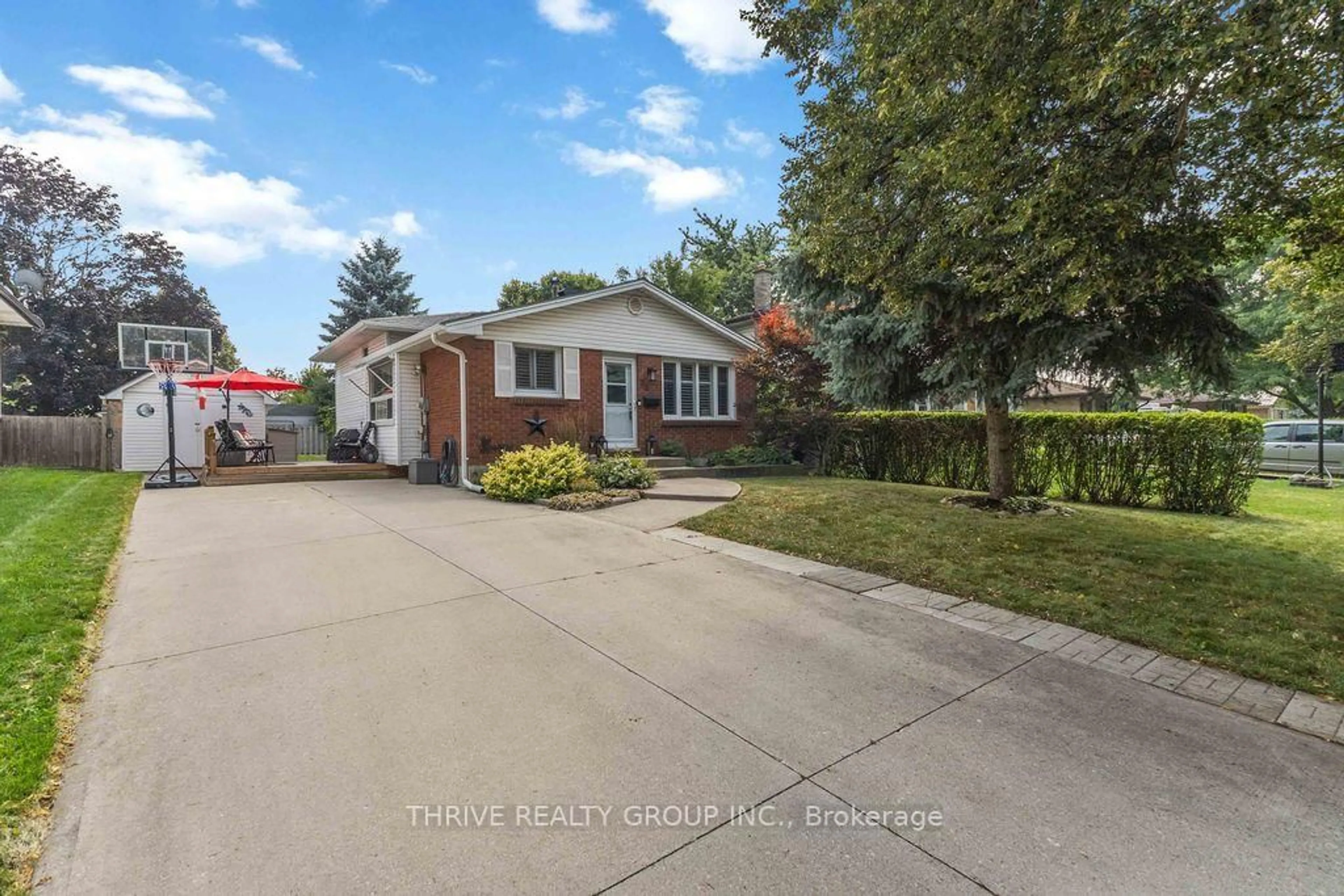 Home with brick exterior material, street for 35 Surrey Cres, London South Ontario N6E 1T7