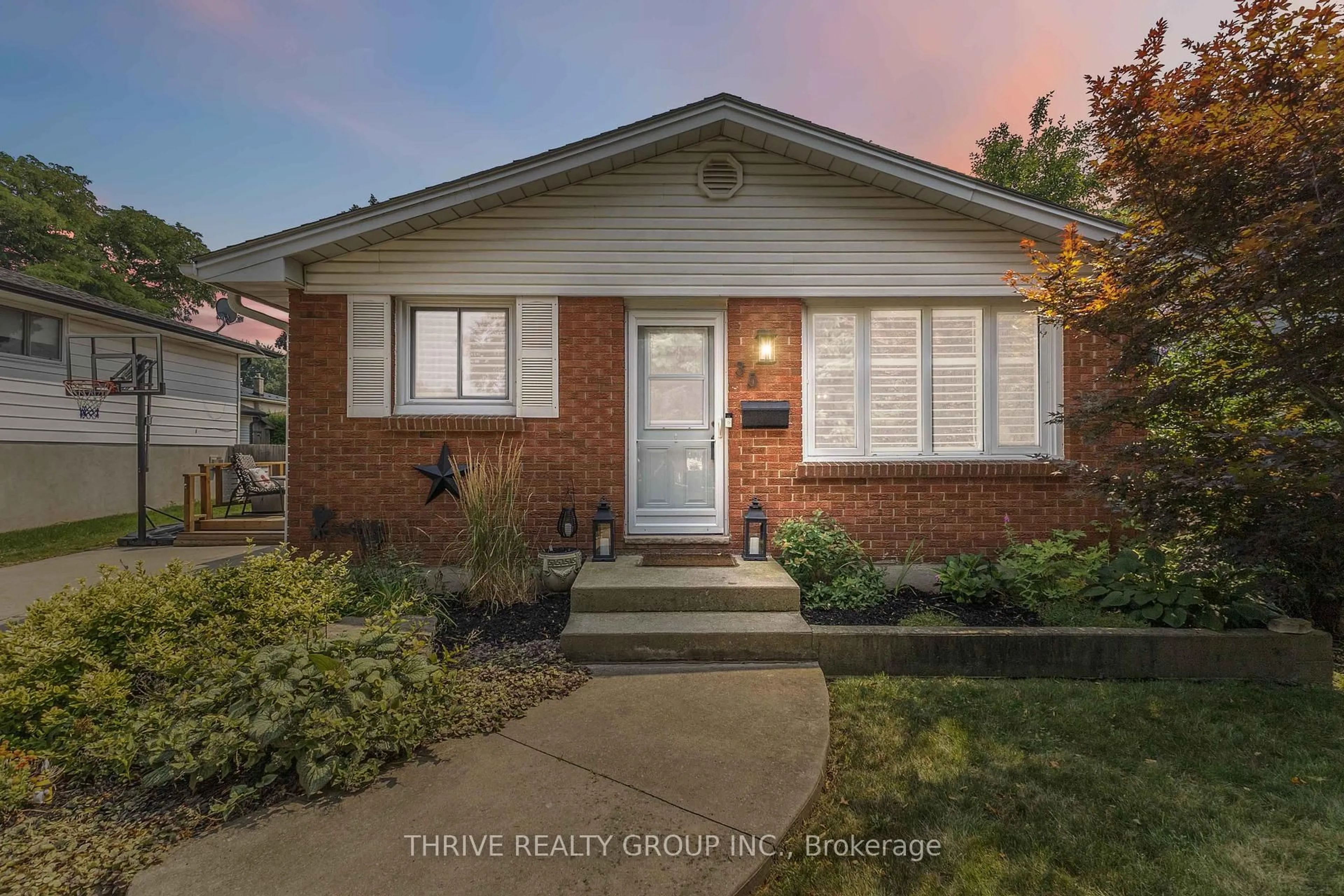 Home with brick exterior material, street for 35 Surrey Cres, London South Ontario N6E 1T7