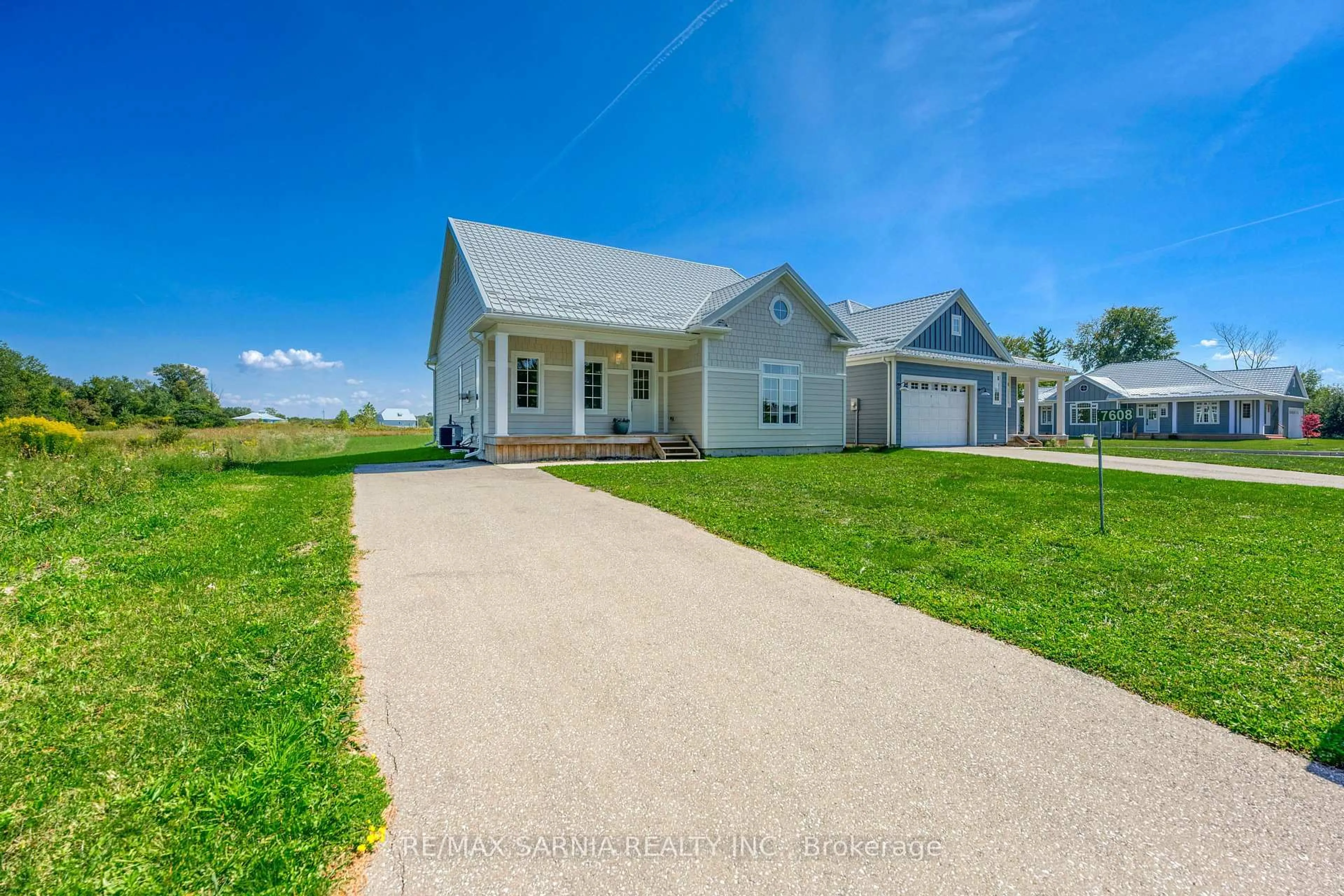 Home with vinyl exterior material, street for 7608 THOMAS St, Plympton-Wyoming Ontario N0N 1J0