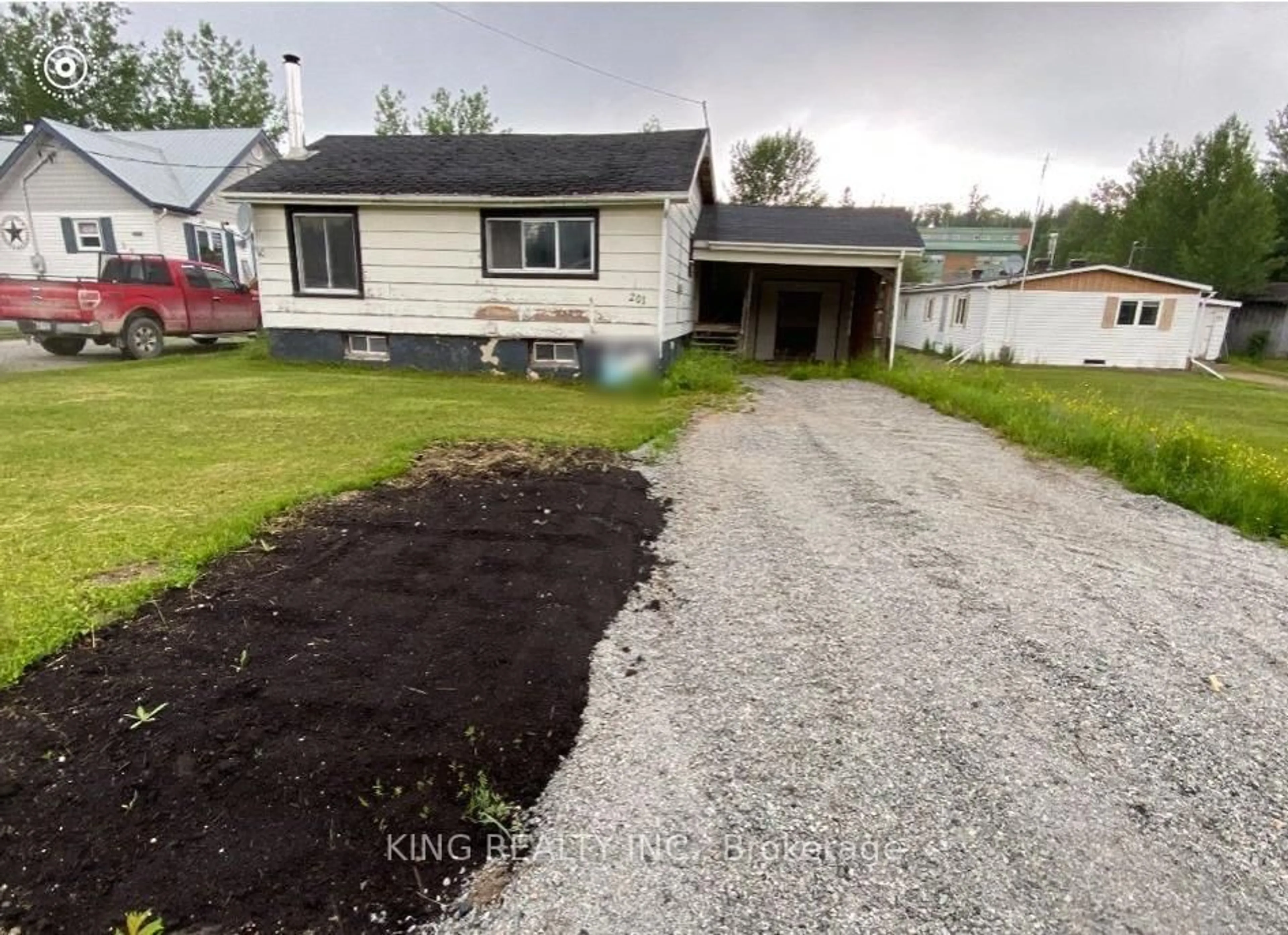 A pic from outside/outdoor area/front of a property/back of a property/a pic from drone, street for 201 Third Ave, Hornepayne Ontario P0M 1Z0