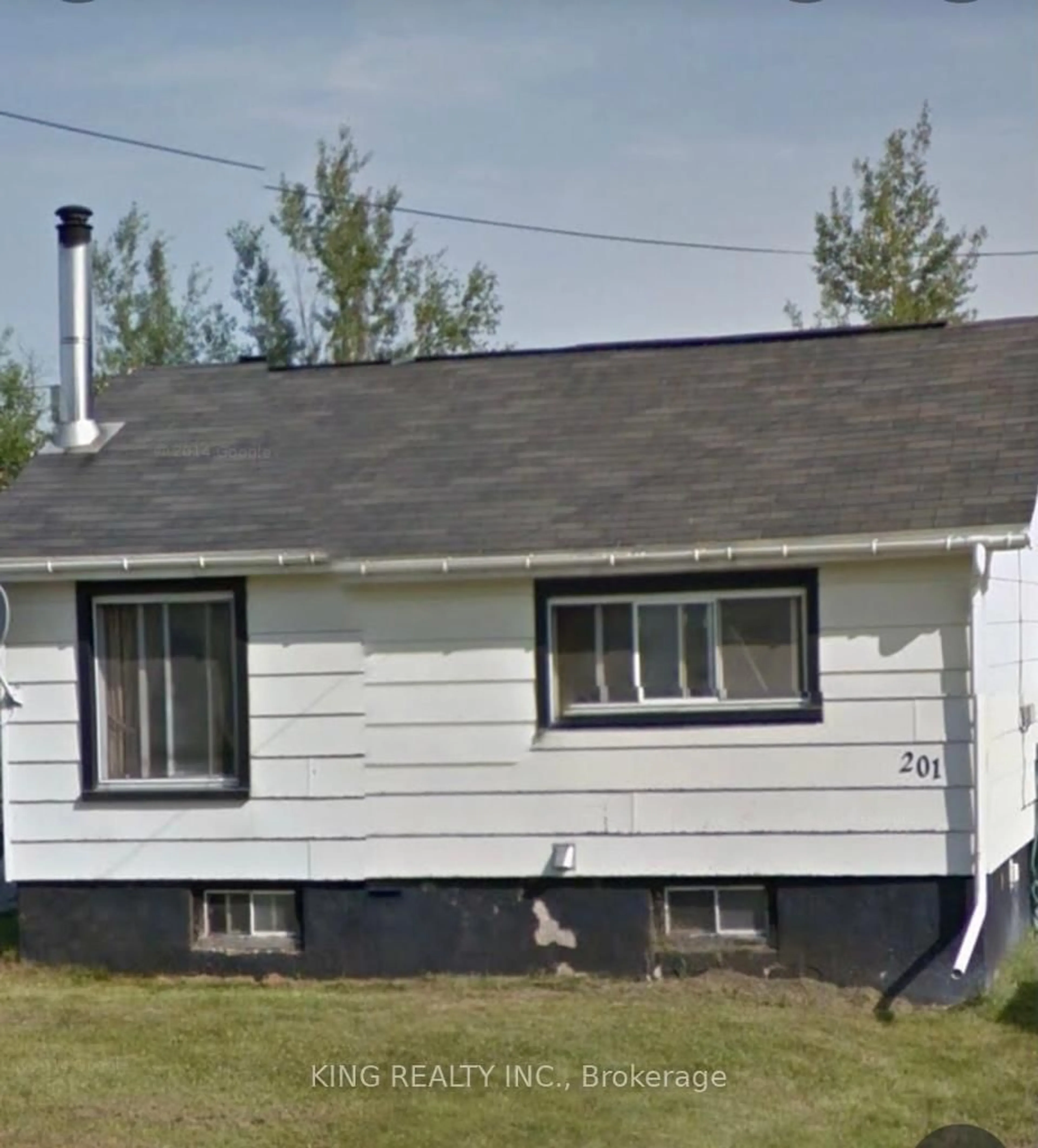 Home with vinyl exterior material, street for 201 Third Ave, Hornepayne Ontario P0M 1Z0