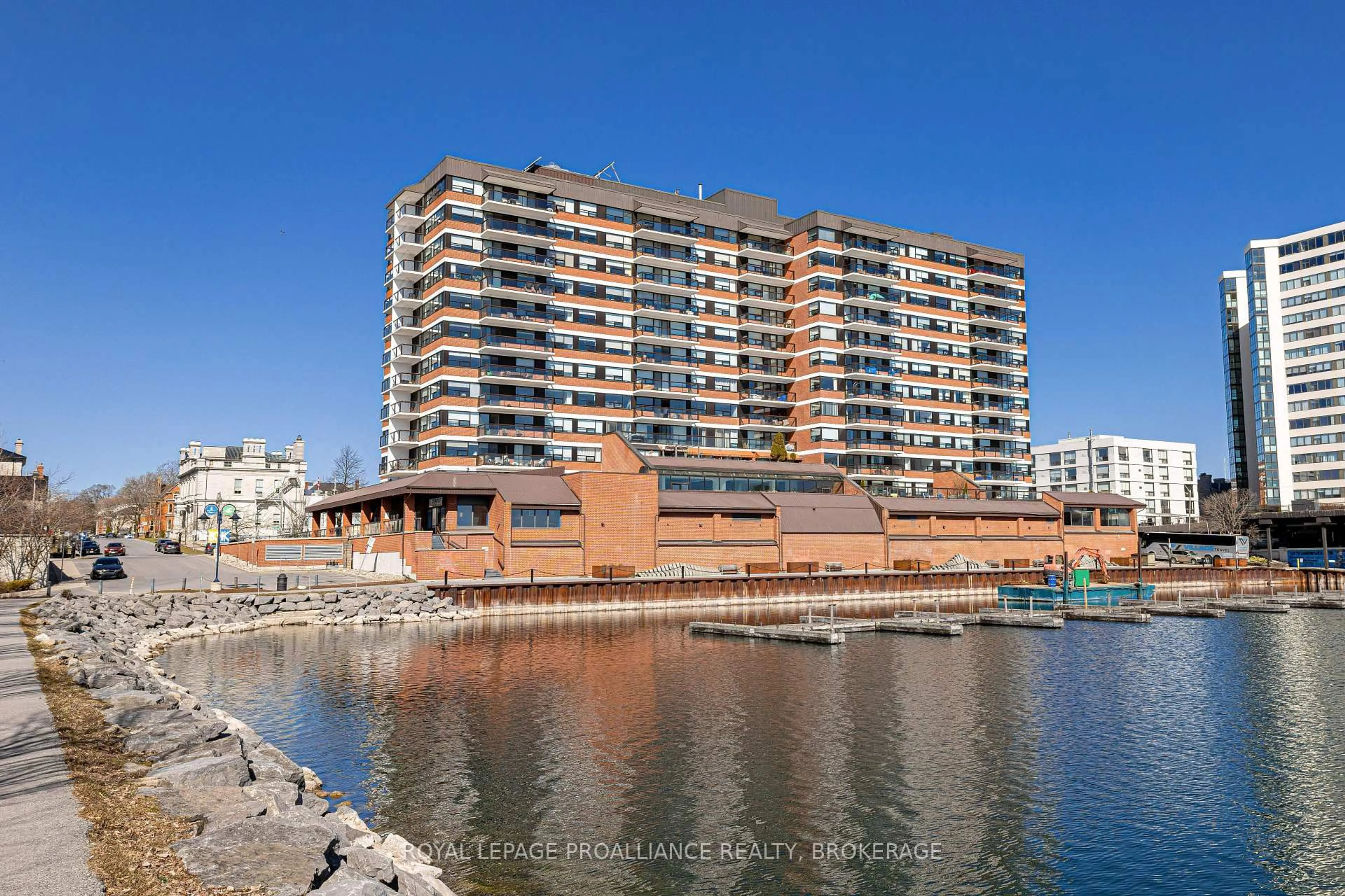 A pic from outside/outdoor area/front of a property/back of a property/a pic from drone, water/lake/river/ocean view for 165 Ontario St #301, Kingston Ontario K7L 2Y6