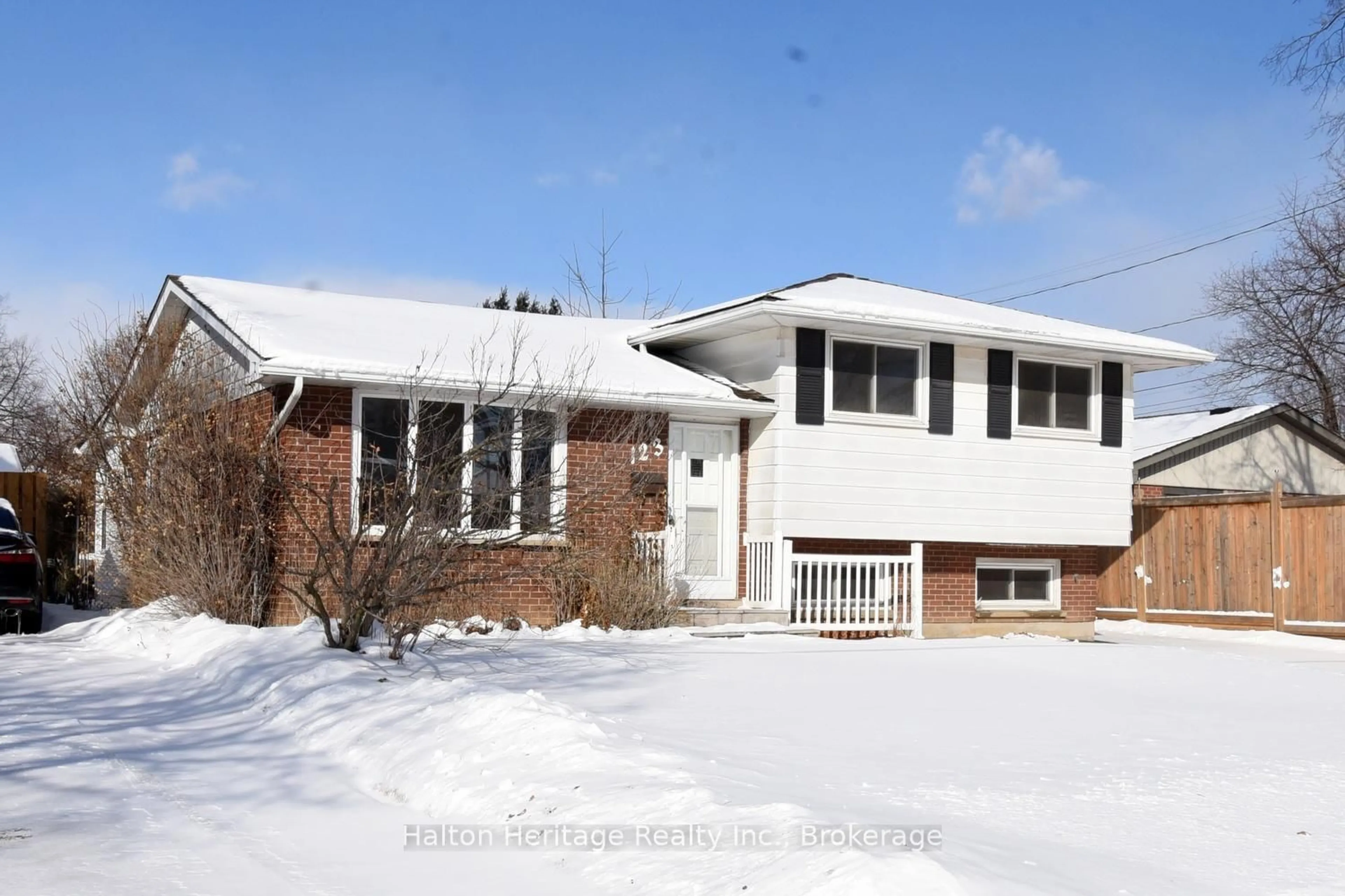 Home with vinyl exterior material, street for 123 Woodman Dr, Hamilton Ontario L8H 2M6