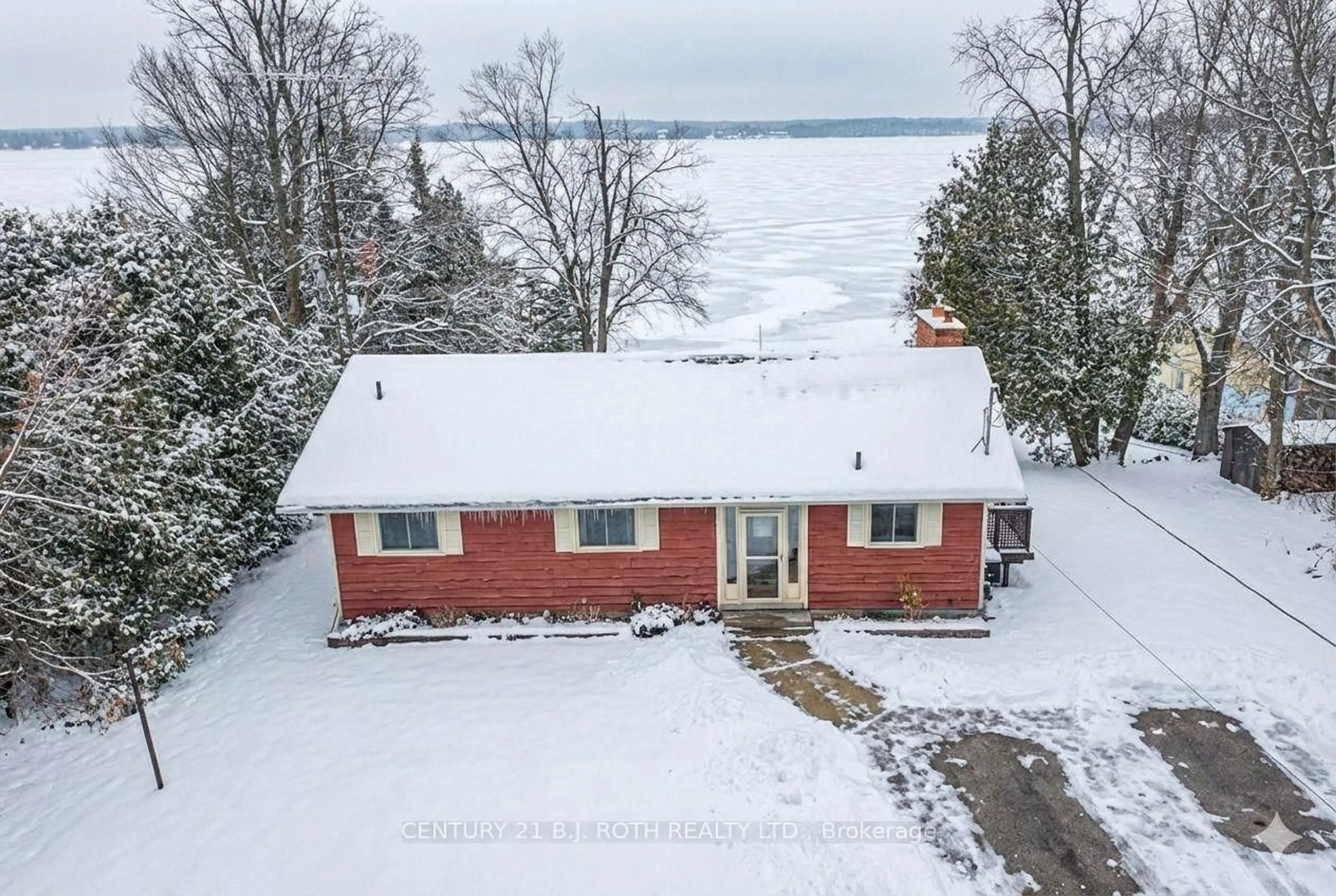 A pic from outside/outdoor area/front of a property/back of a property/a pic from drone, water/lake/river/ocean view for 71 Campbell Beach Rd, Kawartha Lakes Ontario L0K 1B0