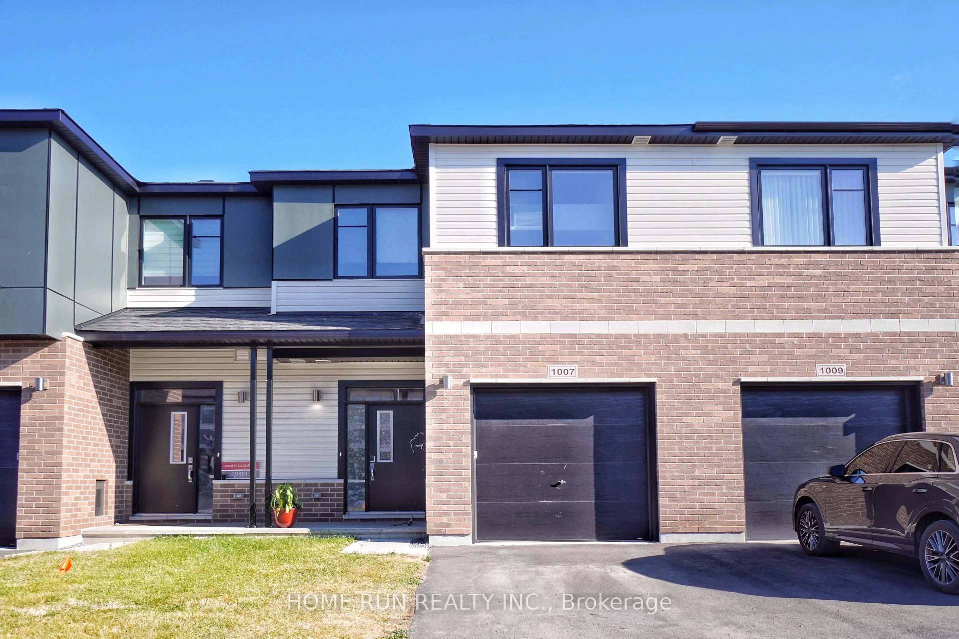 Home with brick exterior material, street for 1007 Acoustic Way, Ottawa Ontario K4M 0Y2