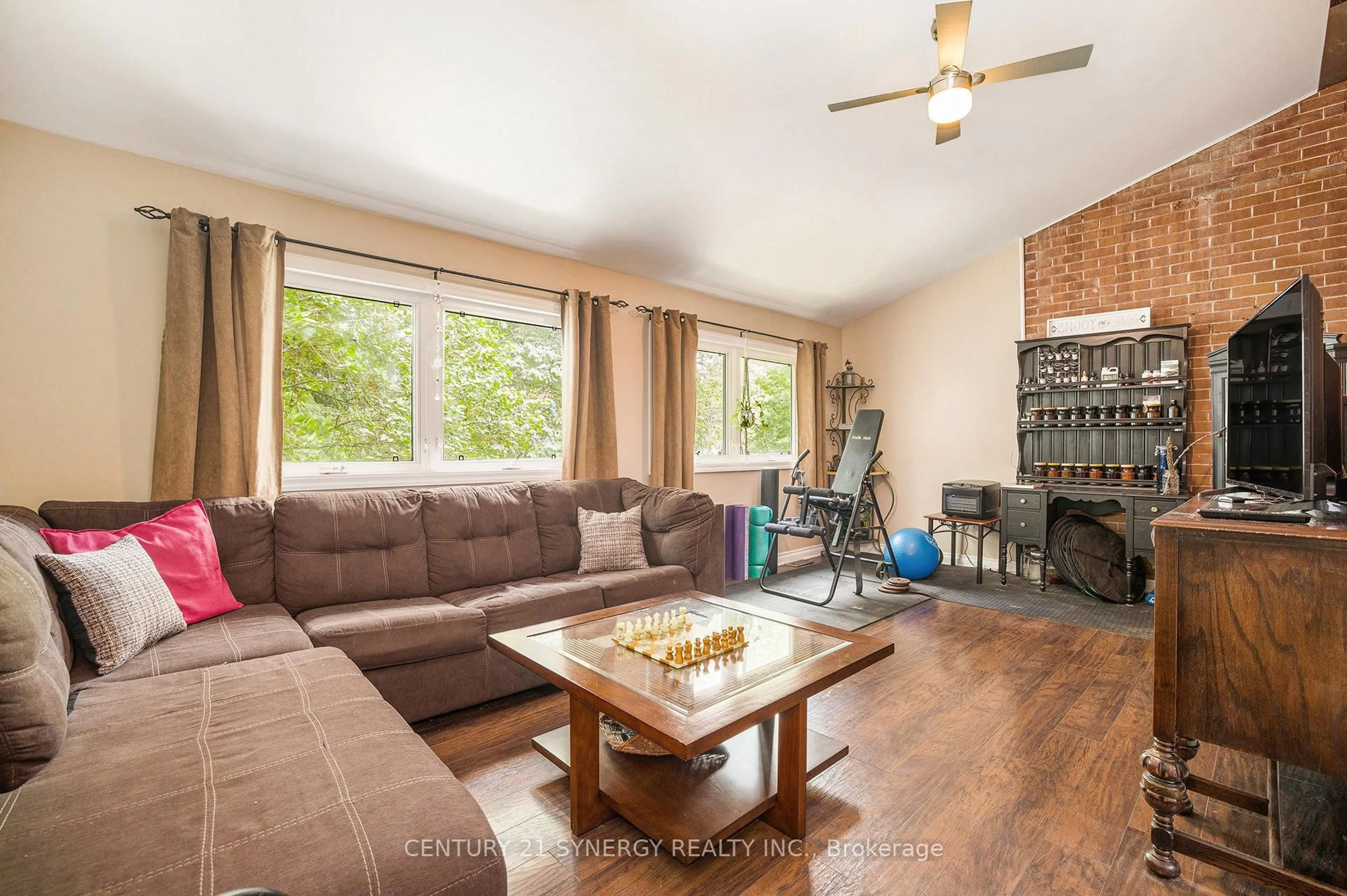 Living room with furniture, wood/laminate floor for 146 Wolford Ctr Rd, Merrickville-Wolford Ontario K0G 1N0