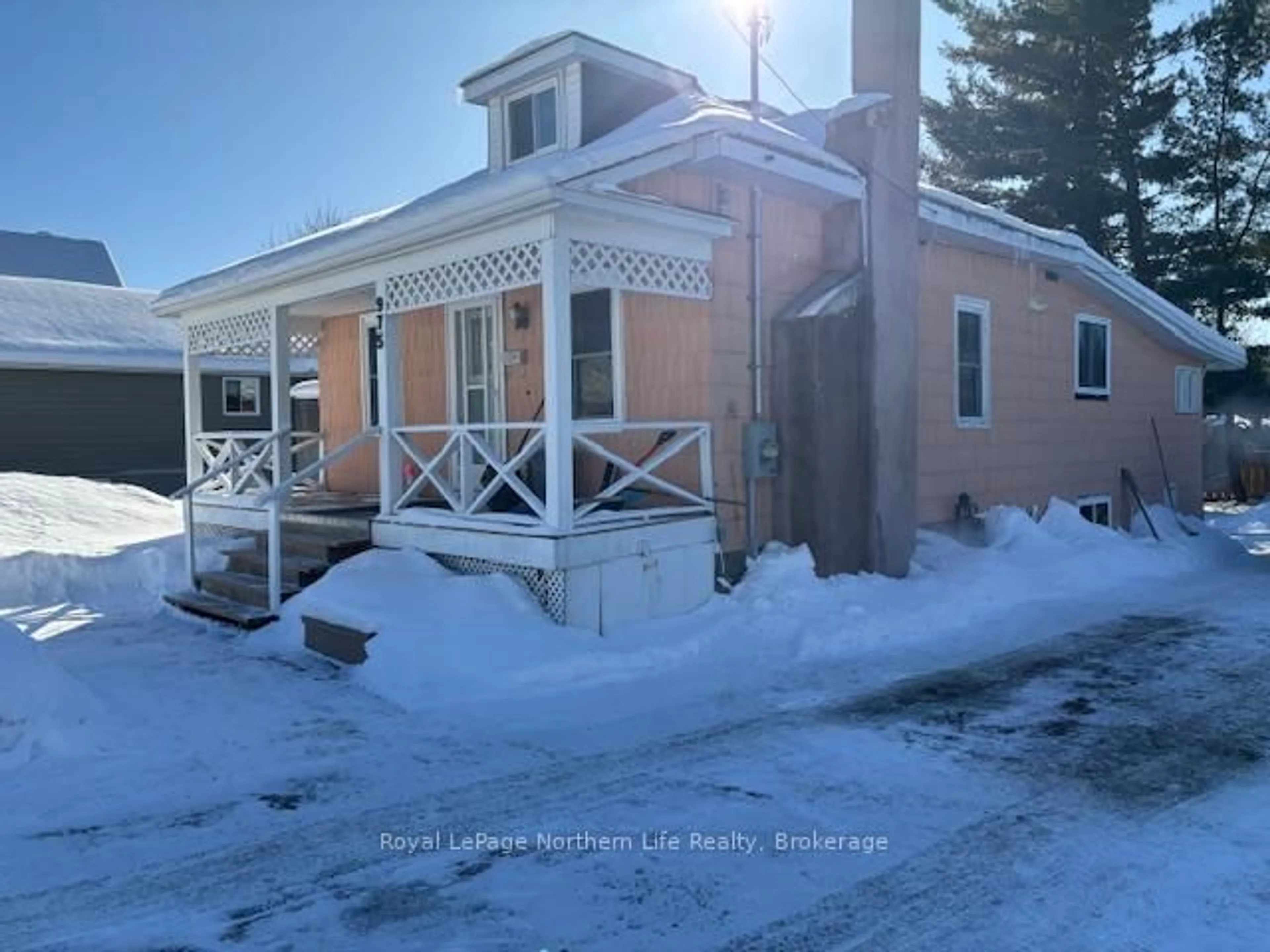 A pic from outside/outdoor area/front of a property/back of a property/a pic from drone, street for 975 McIntyre St, North Bay Ontario P1B 3A5