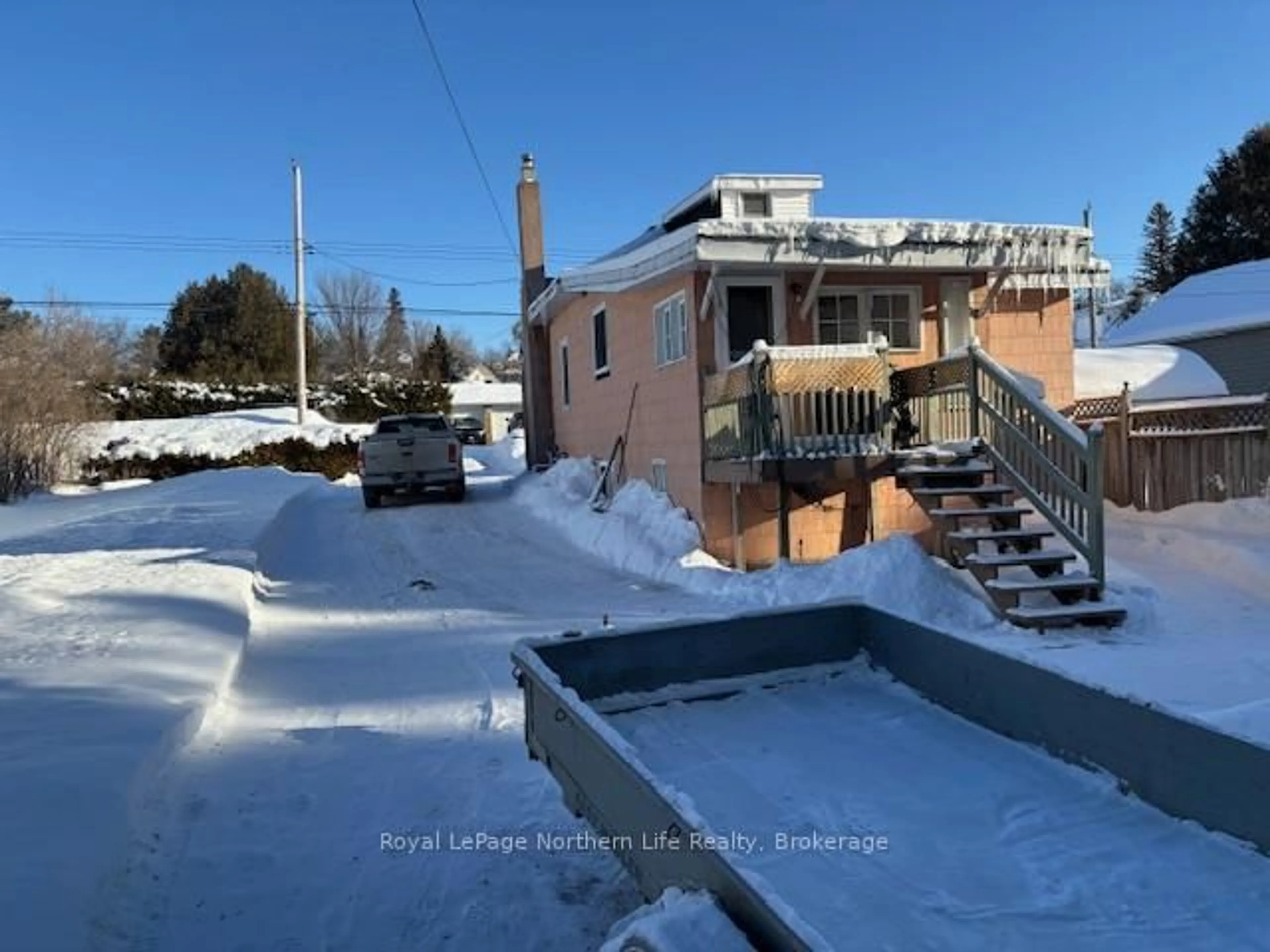 A pic from outside/outdoor area/front of a property/back of a property/a pic from drone, street for 975 McIntyre St, North Bay Ontario P1B 3A5