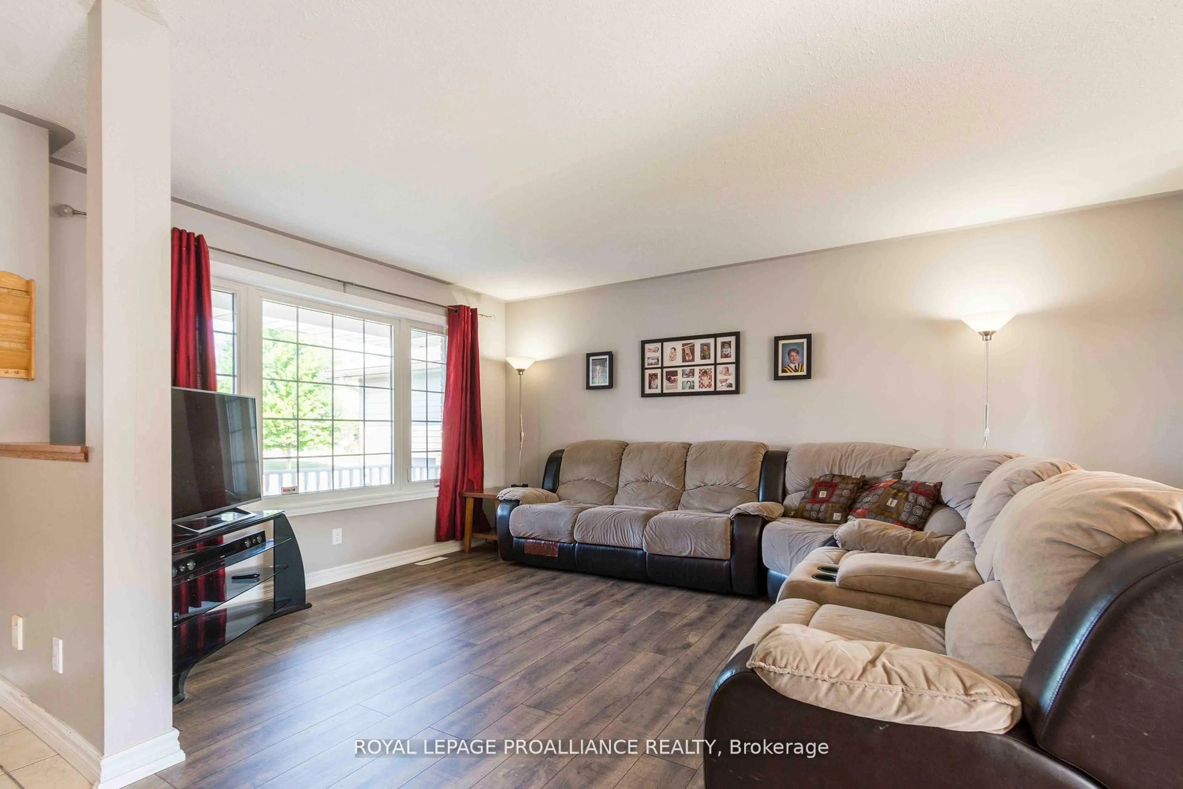 Living room with furniture, wood/laminate floor for 35 Forest Valley Dr, Hastings Ontario K0K 2C0