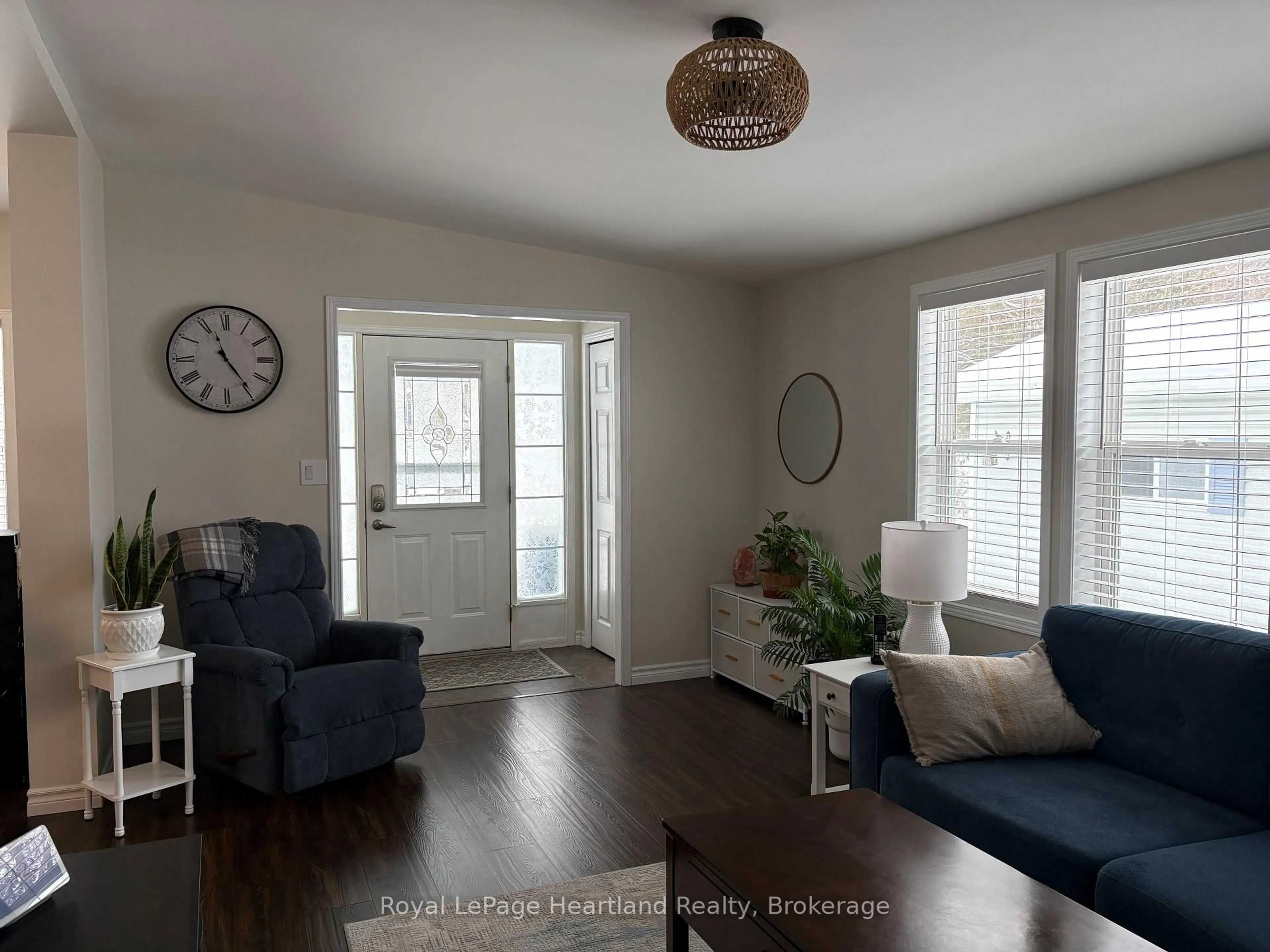 Living room with furniture, wood/laminate floor for 15 Huron Lane, Ashfield-Colborne-Wawanosh Ontario N7A 3Y2