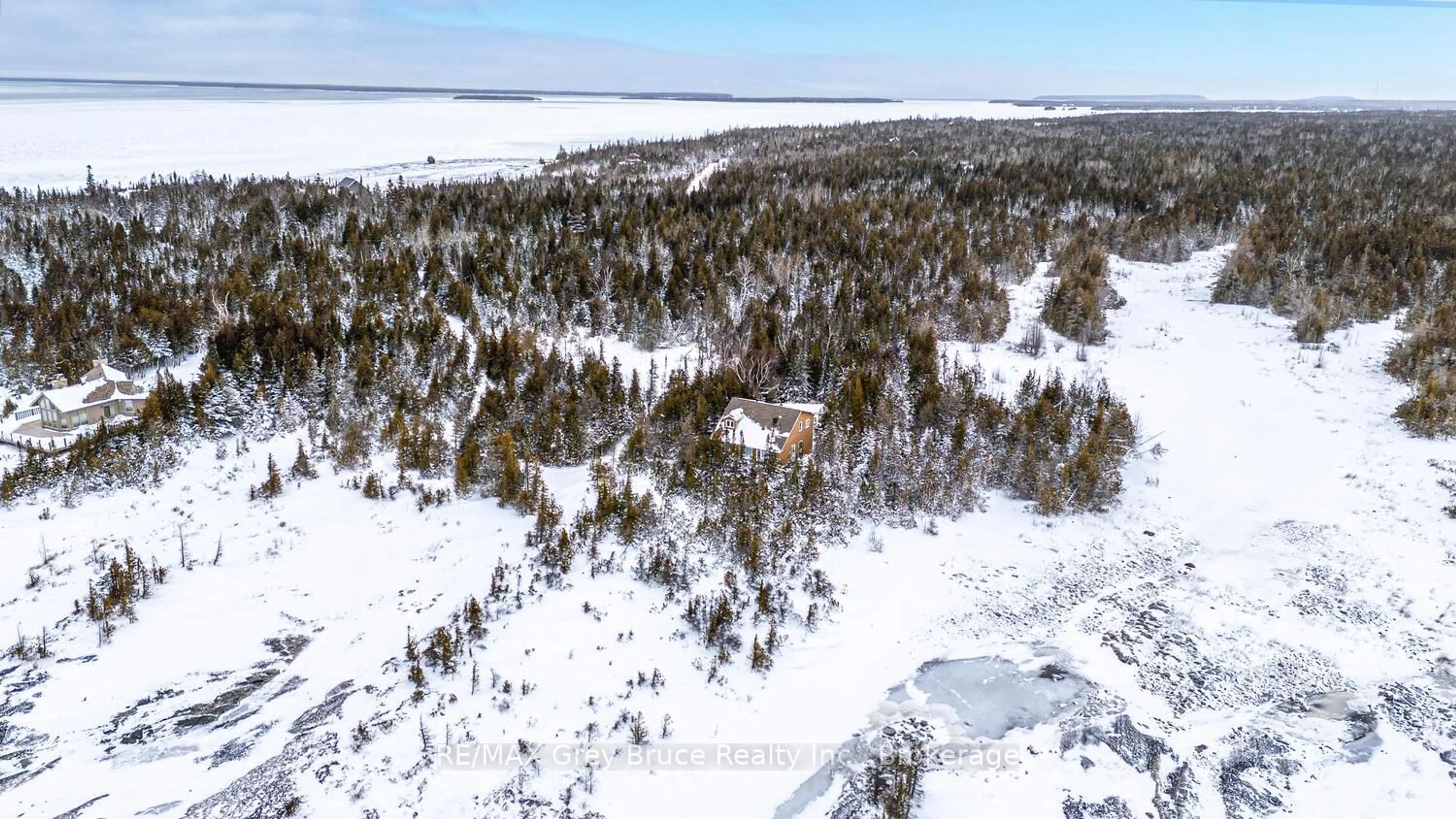 A pic from outside/outdoor area/front of a property/back of a property/a pic from drone, unknown for 159 Zorra Dr, Northern Bruce Peninsula Ontario N0H 2R0
