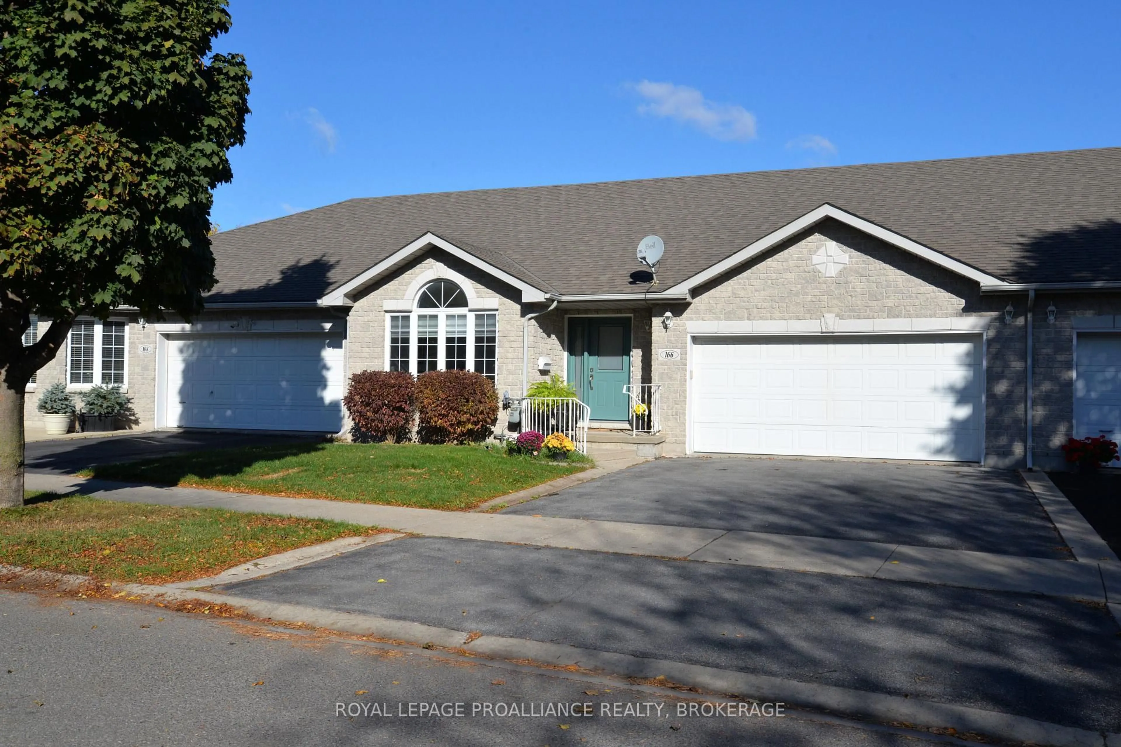 Home with vinyl exterior material, street for 166 Ellesmeer Ave, Kingston Ontario K7P 3H6