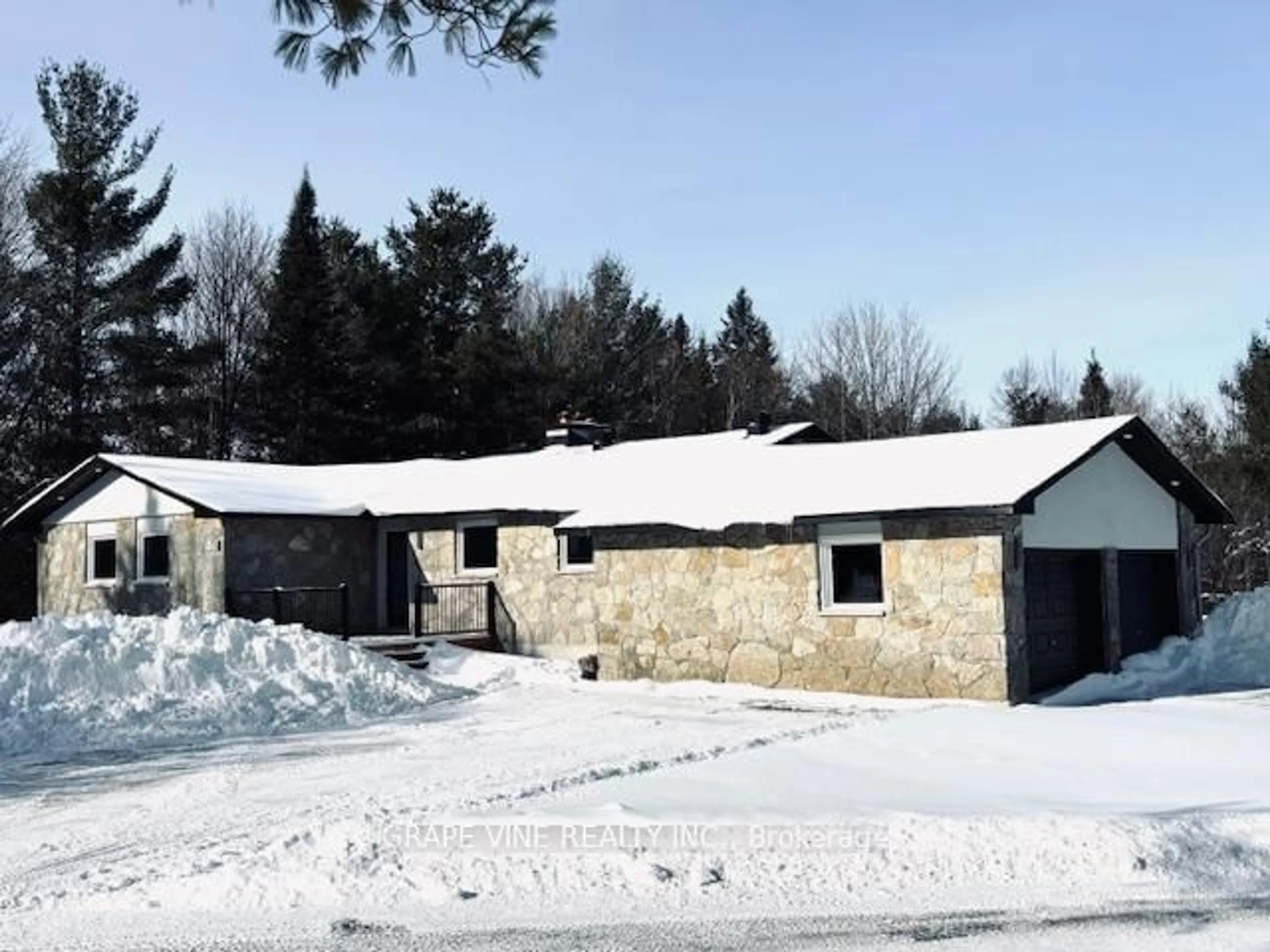 A pic from outside/outdoor area/front of a property/back of a property/a pic from drone, building for 135 Manion Rd, Carp Ontario K0A 1L0