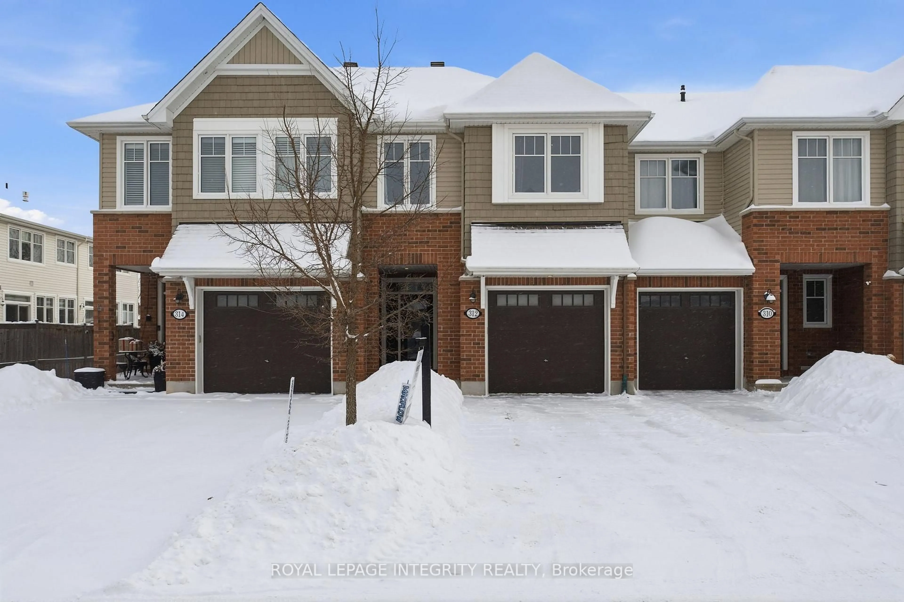 Home with brick exterior material, street for 312 Wood Acres Grve, Ottawa Ontario K1T 0M5