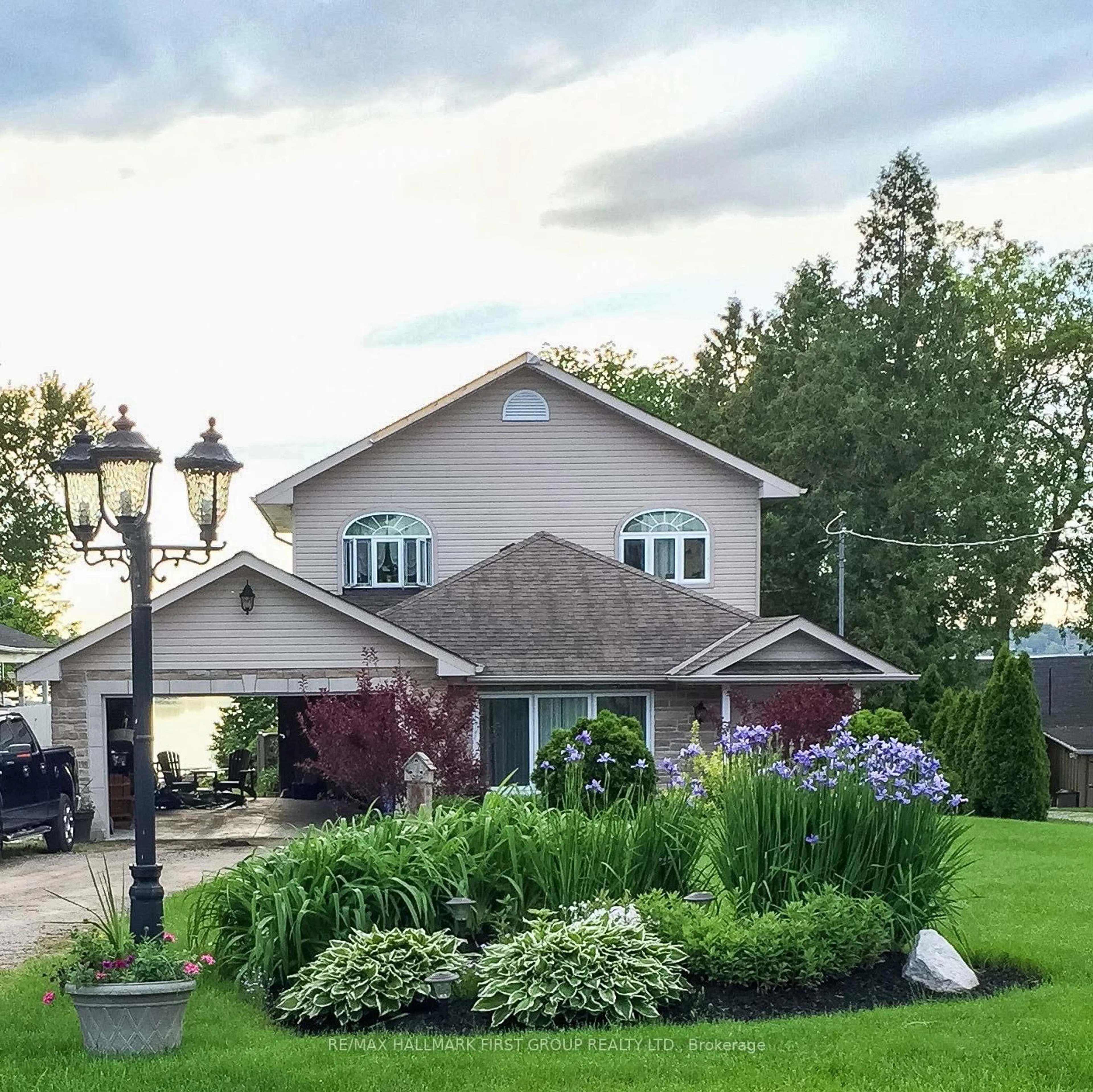 Home with vinyl exterior material, street for 61 Druan Dr, Kawartha Lakes Ontario L0C 1G0