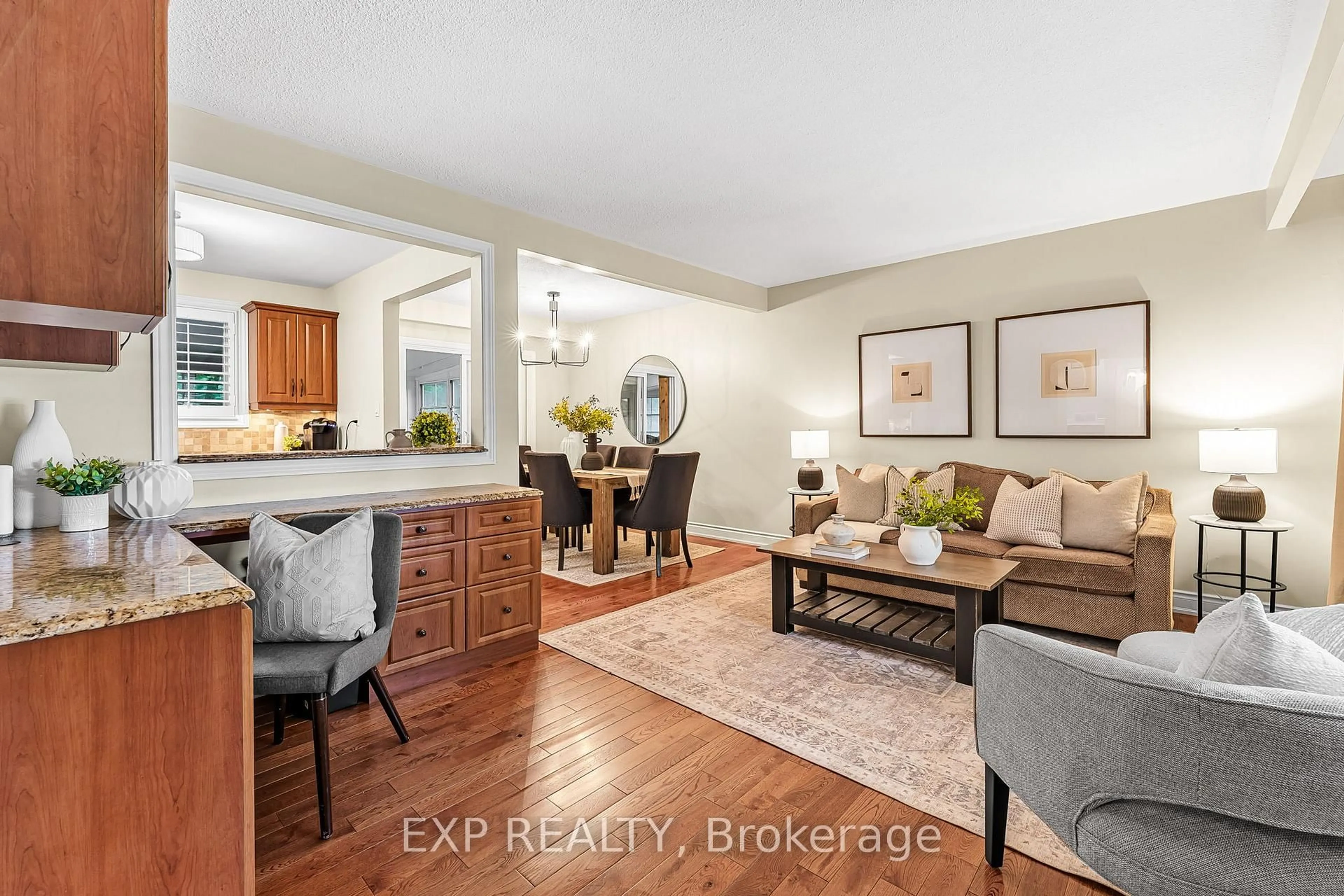 Living room with furniture, wood/laminate floor for 29 Millwood Rd, Erin Ontario N0B 1T0