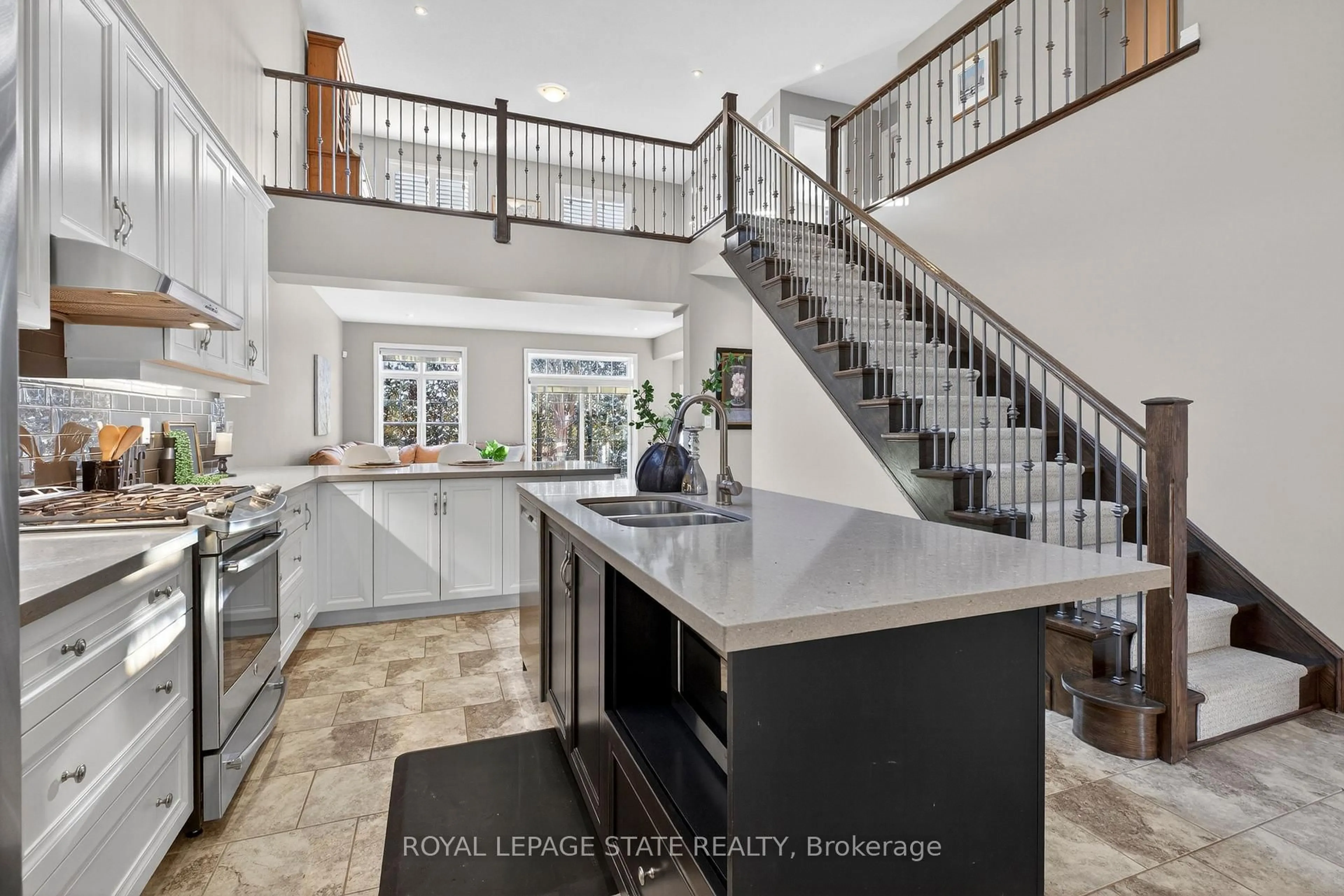 Open concept kitchen, ceramic/tile floor for 27 Black Walnut Cres, Hamilton Ontario L9K 0B7